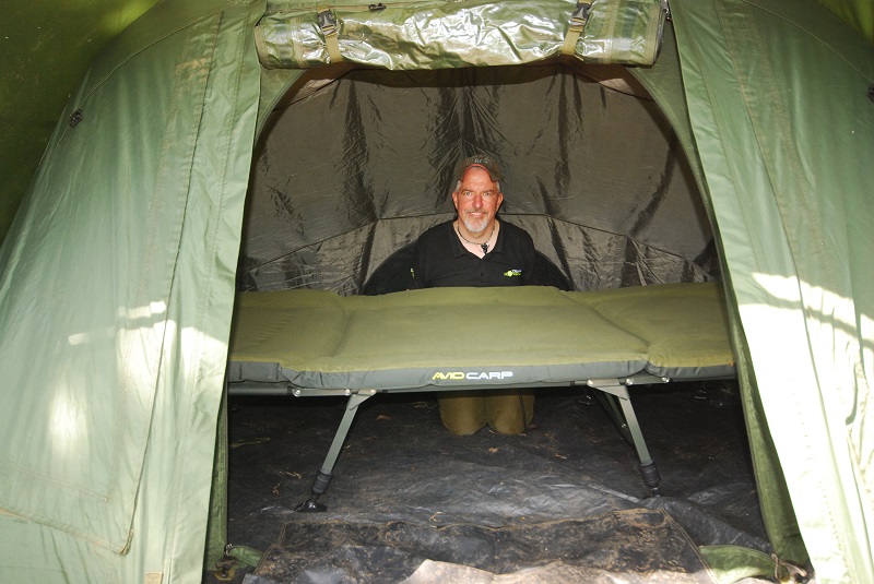 Mark with his godsend of a bed
