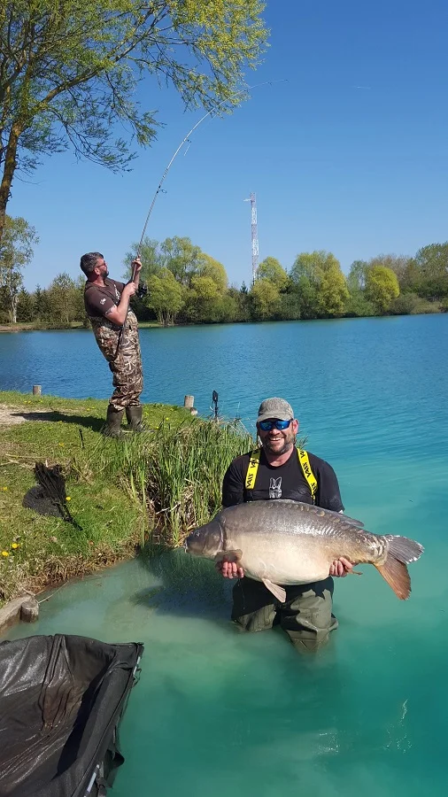 Tim cradles a seventy, while his brother picks up the bite from the Scarred Fish!