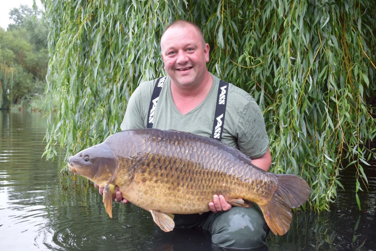 No wonder he's smiling, it broke his pb