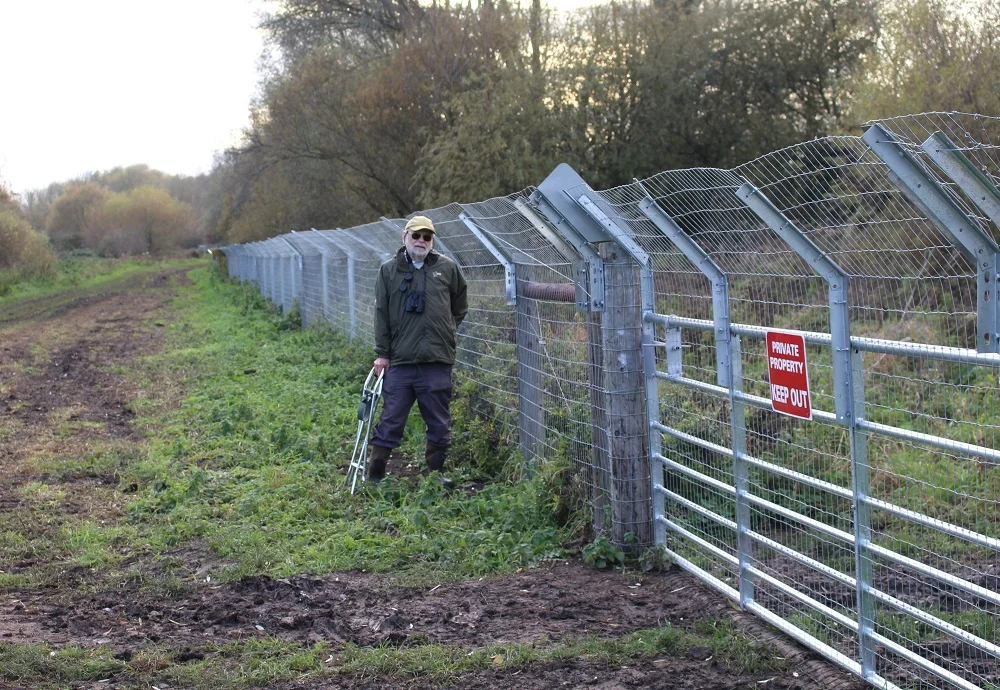 Steve Burke and his otter fence