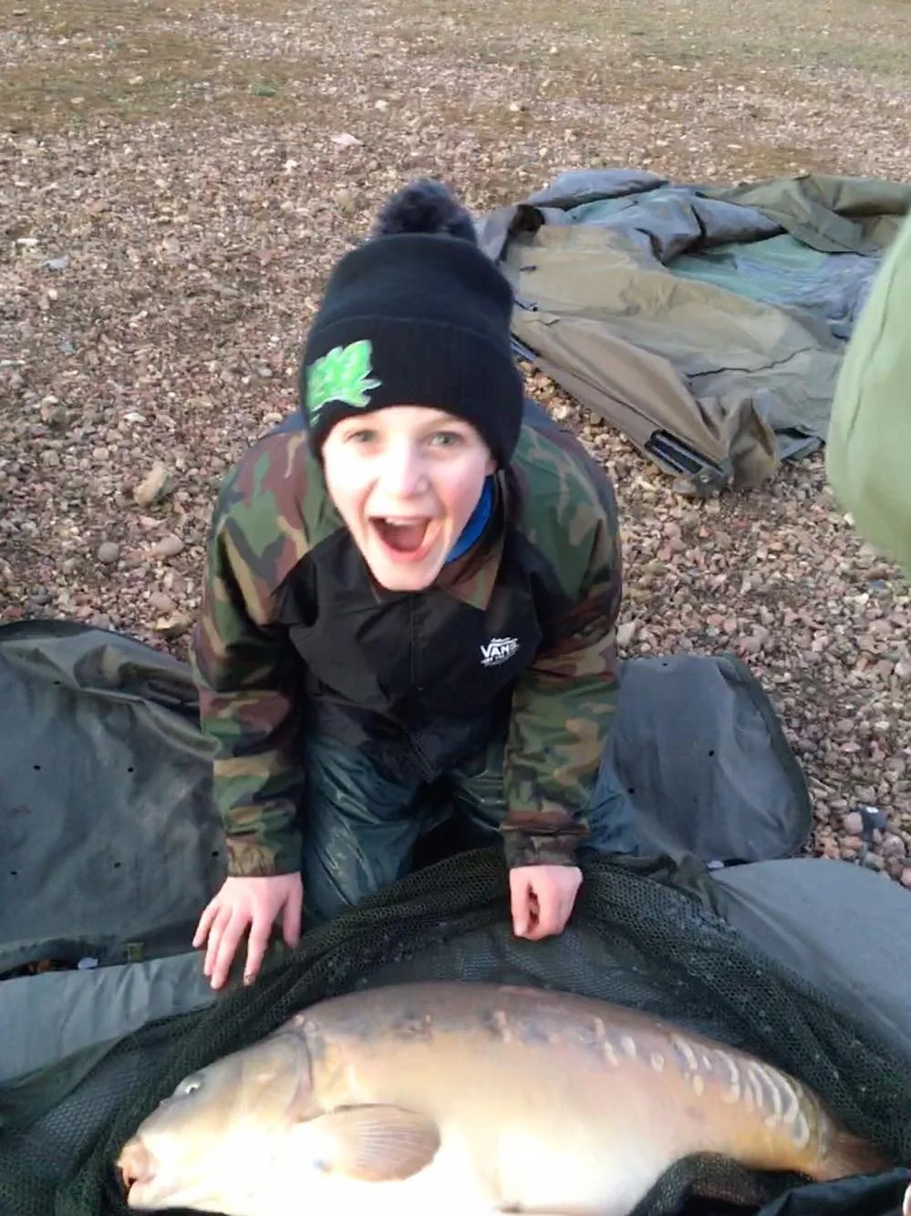 What fishing’s all about - young Evan with his prize