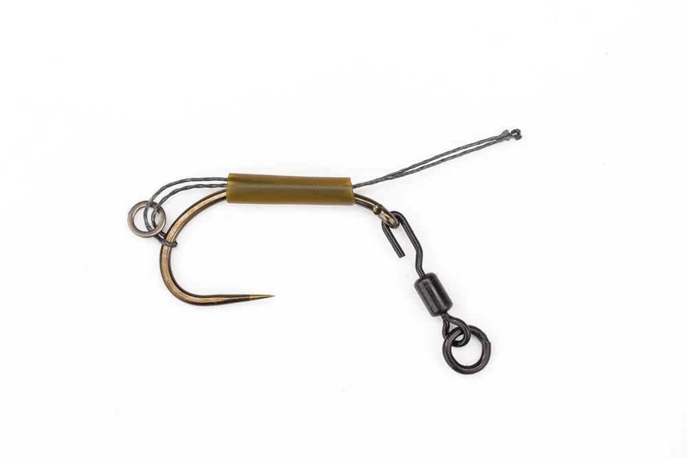Thread the Spinner Swivel through the eye. The open gated end should be closest to the point