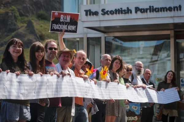Campaigners with the list of petition signatories.