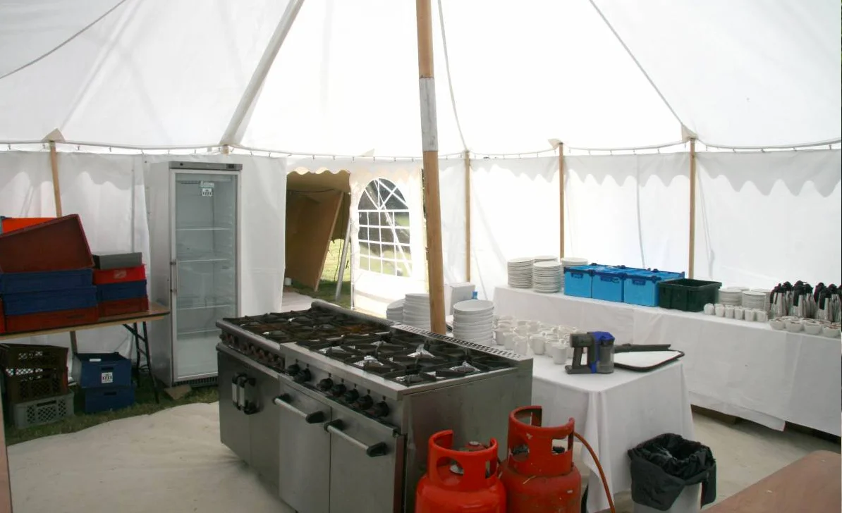 CATERING TENT Our 6x3m catering tent comes equipped with trestle tables, a washing up station and a range of catering equipment including electric hobs, oven, rice cooker, steamer, deep fryer, sandwich press and all the necessary pans and cooking tools.
