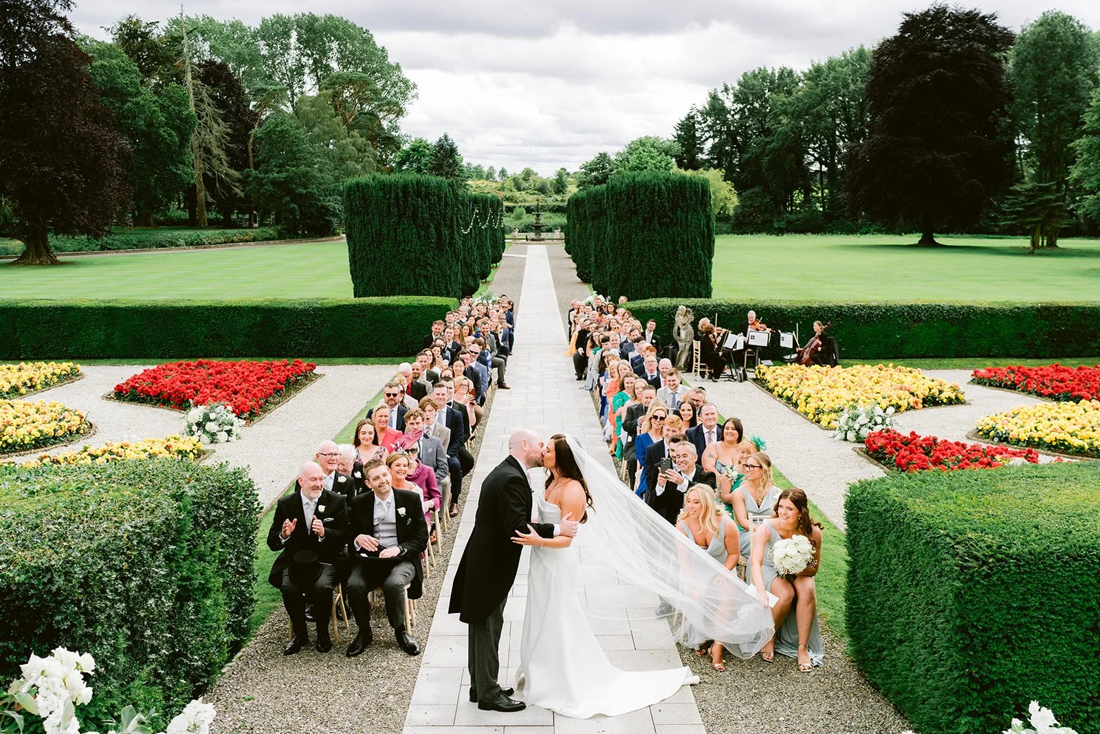 Outdoor wedding ceremony at The K Club Ireland, romantic garden ceremony setup with luxury styling (19).jpg