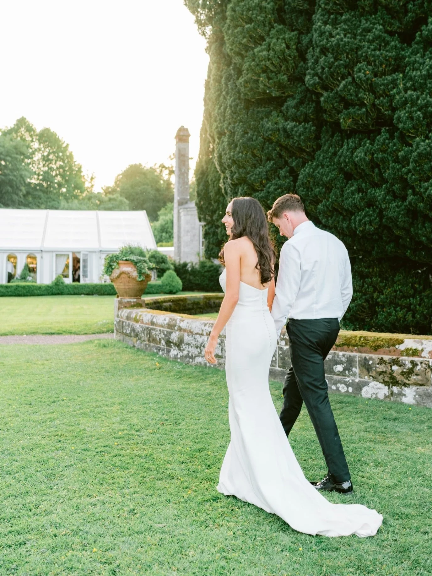 Sunset stroll @castleleslie 🏰🥂

Amazing team: 
Venue @castleleslie 
Photo @hellosugar_photography
Dress @thesuitebride @Kyhabride
Make-up @robynbyrnemakeup
Hair @_daniellewhelan 
Video @bandgweddings
Content creator @stellarstudio.ie 
Band @Bentley