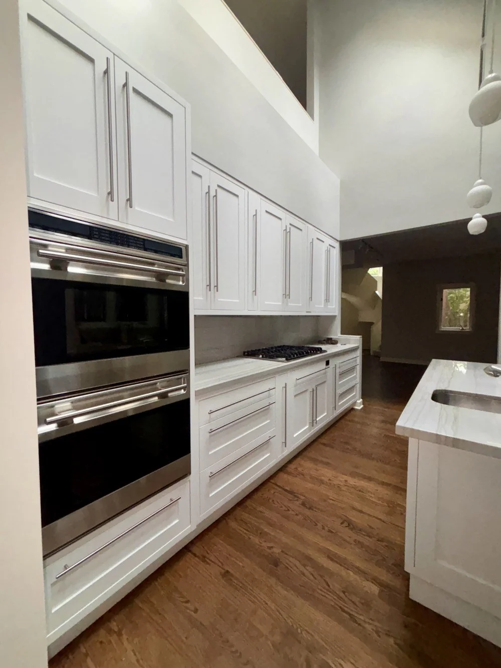 White Shaker Kitchen with Pantry Wet bar & Appliances (35).jpeg