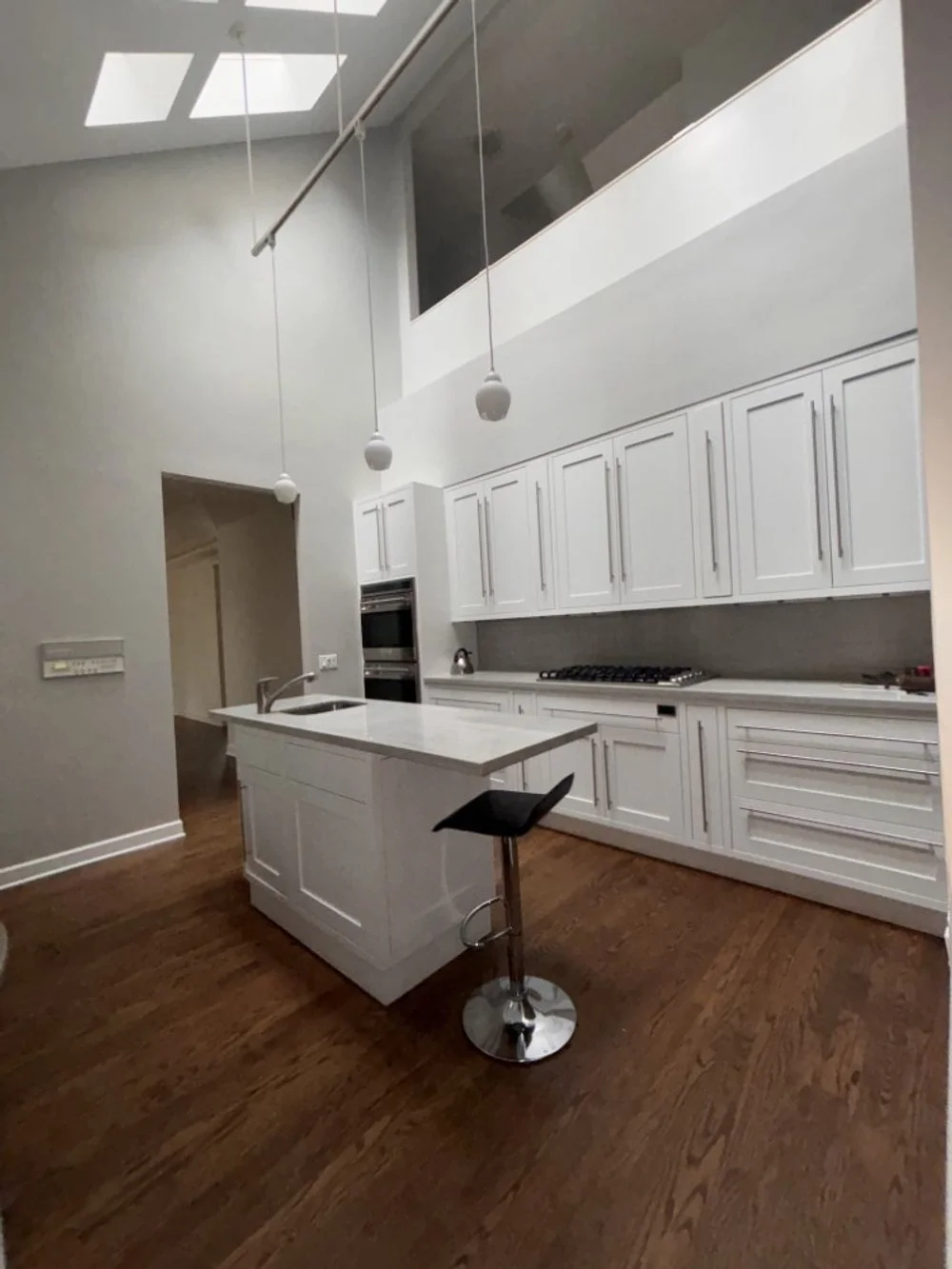 White Shaker Kitchen with Pantry Wet bar & Appliances (40).jpeg