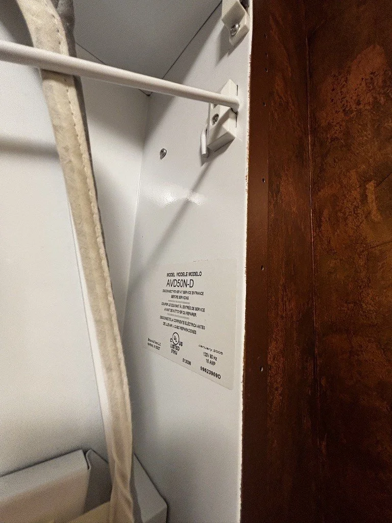 WoodMode Laundry Cabinetry with Sink & In-wall Ironing board (10).jpeg