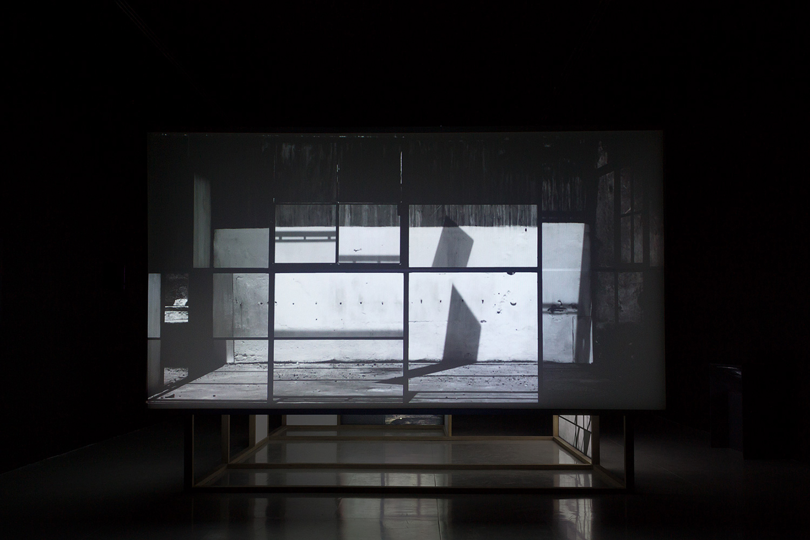    Nada más que las horas , 2013.  Five channel video installation at MAZ Museum. Wood, Formica and polyester screens.300 x 425 x 220 cm. 