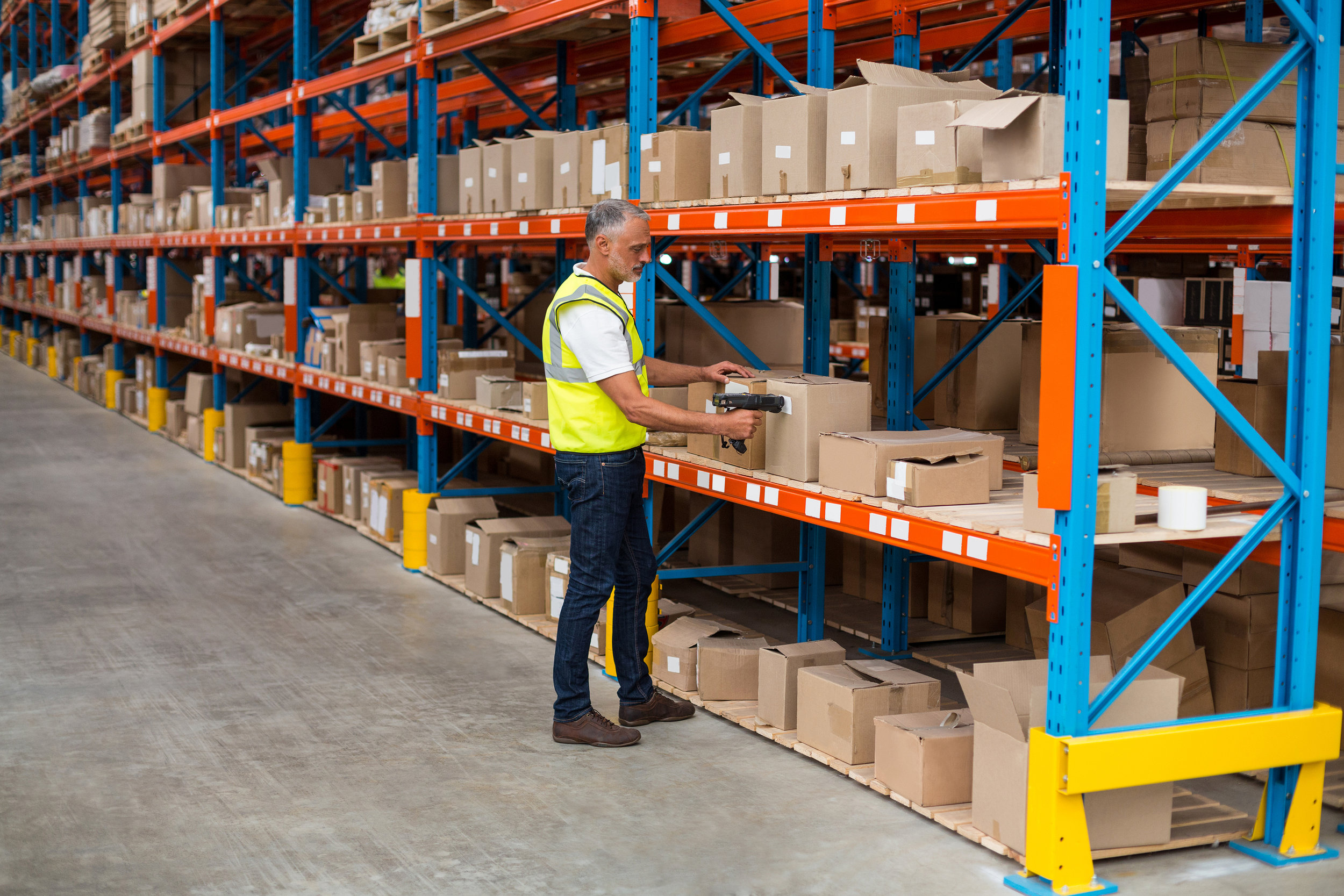 man scanning boxes.jpg