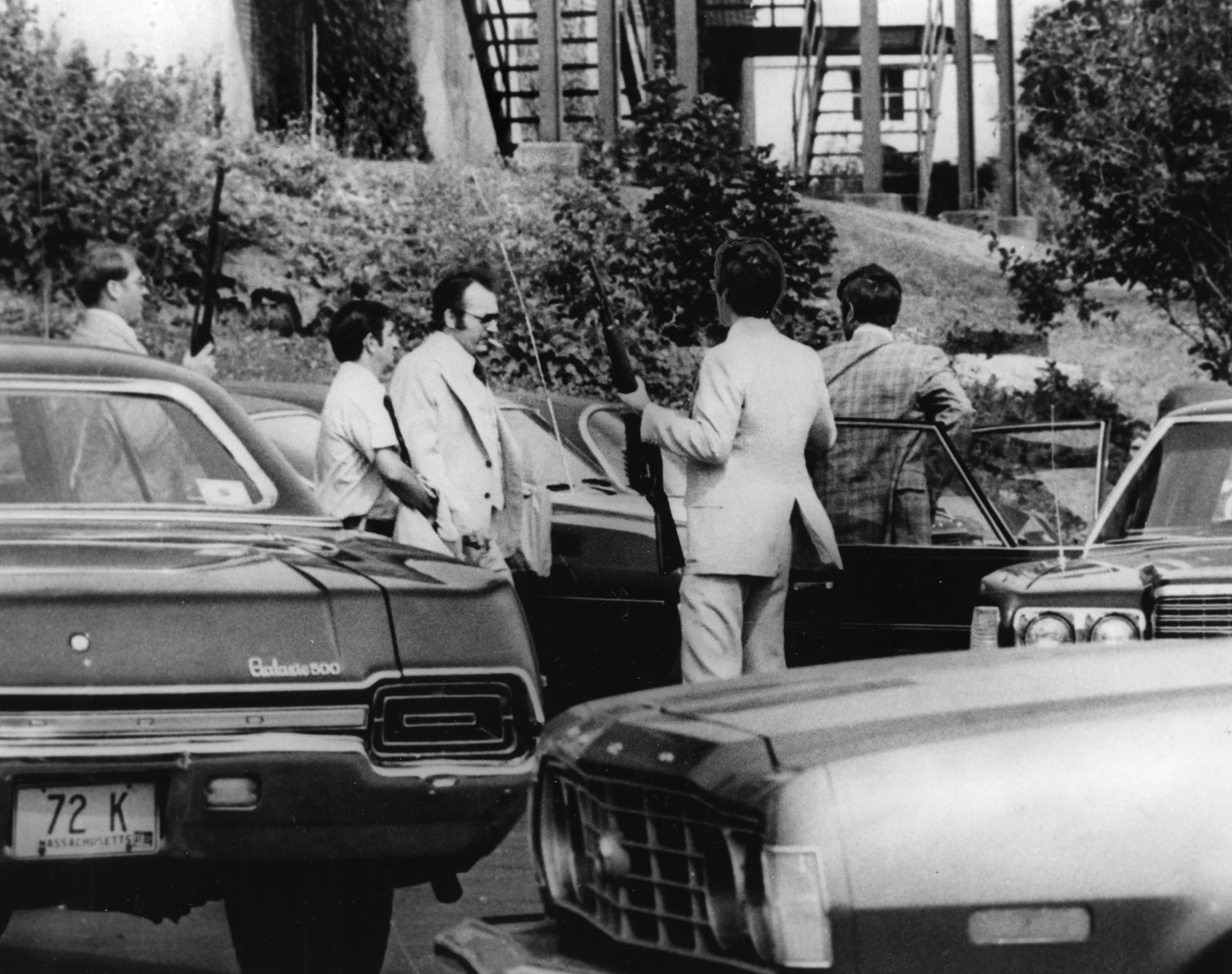 In July 1976, just a few months into the trial, armed guards accompany Robert Dussault into the Franklin County Courthouse in Greenfield, Massachusetts. Courtesy of the Providence Journal.