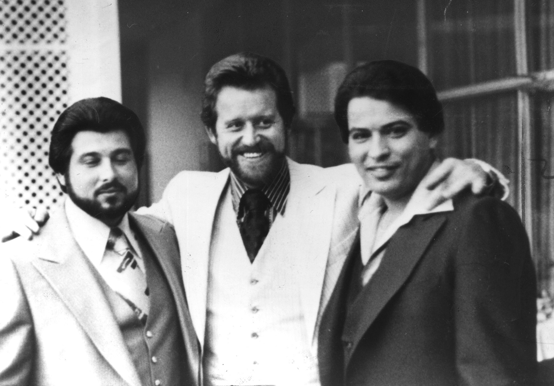 Jerry Tillinghast , center, with his arm around the man he was convicted of murdering, George Basmajian , left. The man on the right is Matthew Guglielmetti, another member of the Patriarca crime family. Courtesy of the Providence Journal .
