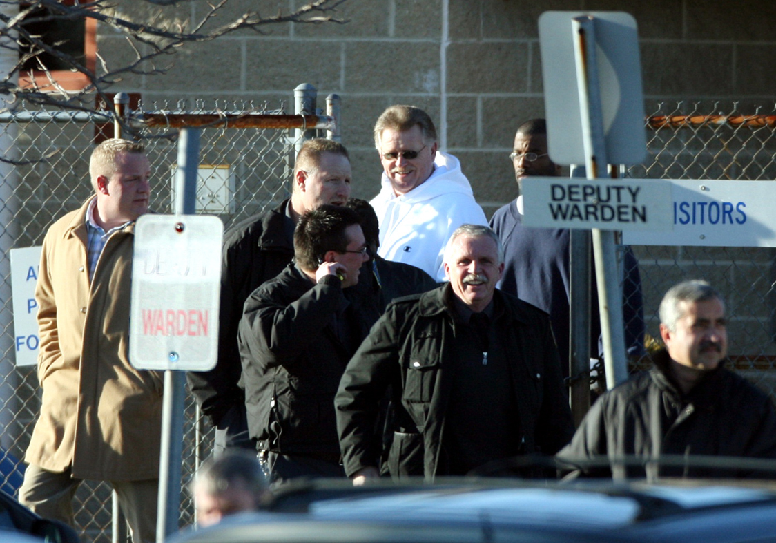 Jerry Tillinghast (center, in a white sweatshirt) was 60 years old when he was released from prison. He spent nearly 30 years behind bars. Courtesy of the Providence Journal/Bob Breidenbach.
