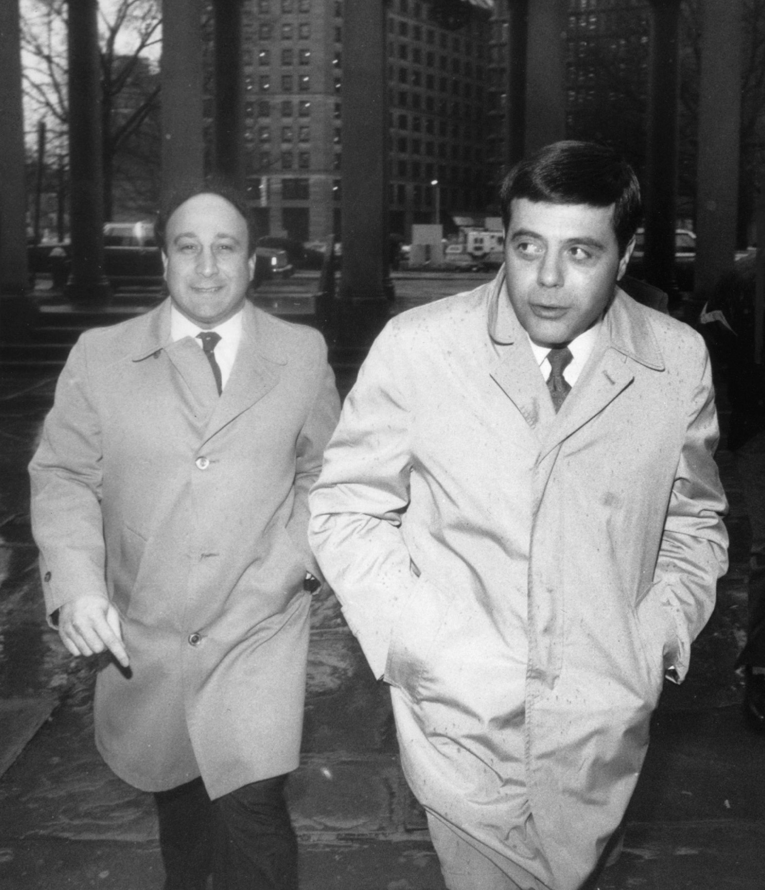 Buddy arrives at Superior Court in Providence in February of 1984. Charles Mansolillo, his chief aide, is pictured with him. Providence Journal file photo/Rachel Ritchie.
