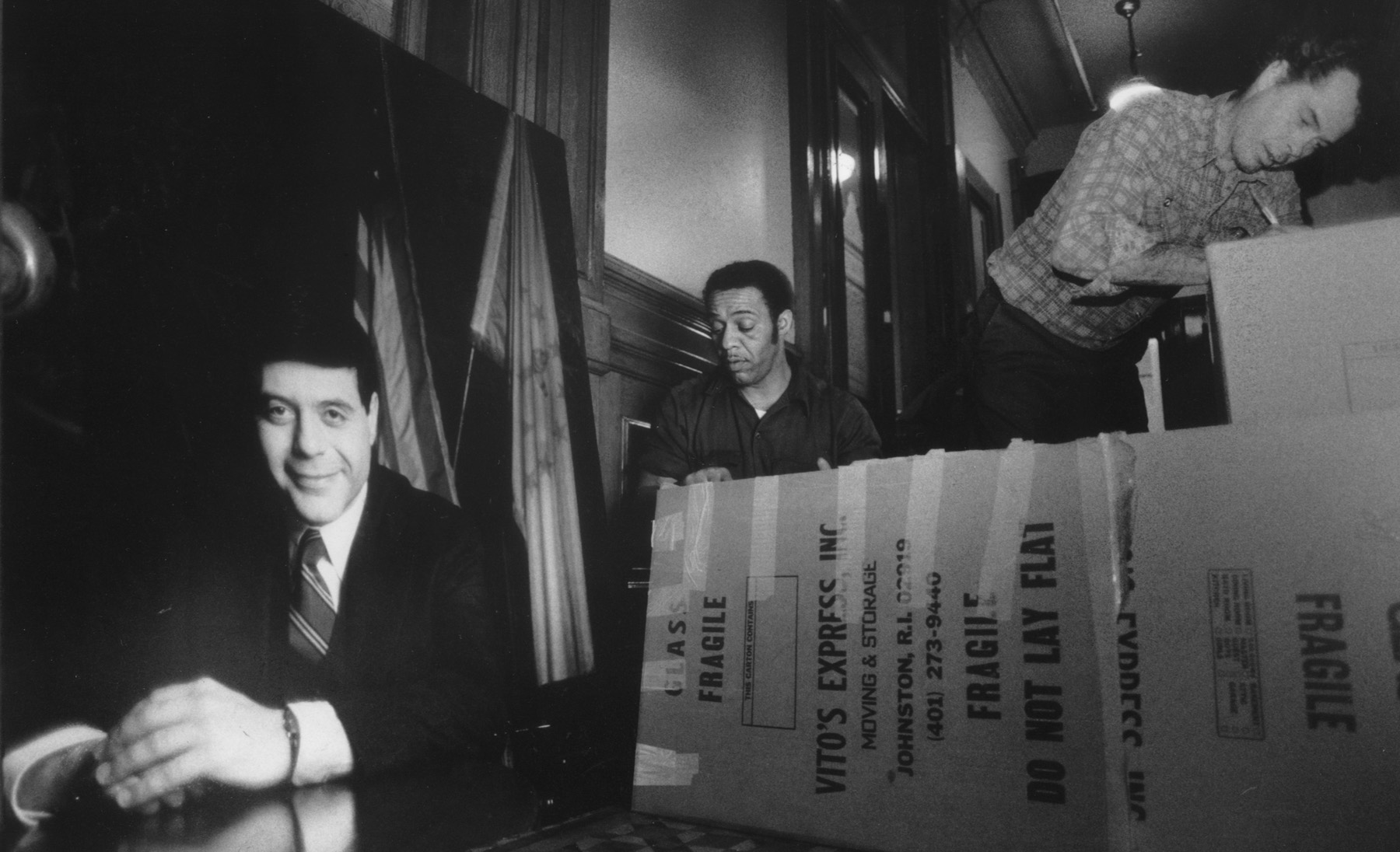 Workers pack boxes at City Hall after Buddy's resignation. Courtesy of the Providence Journal/Andrew Dickerman.