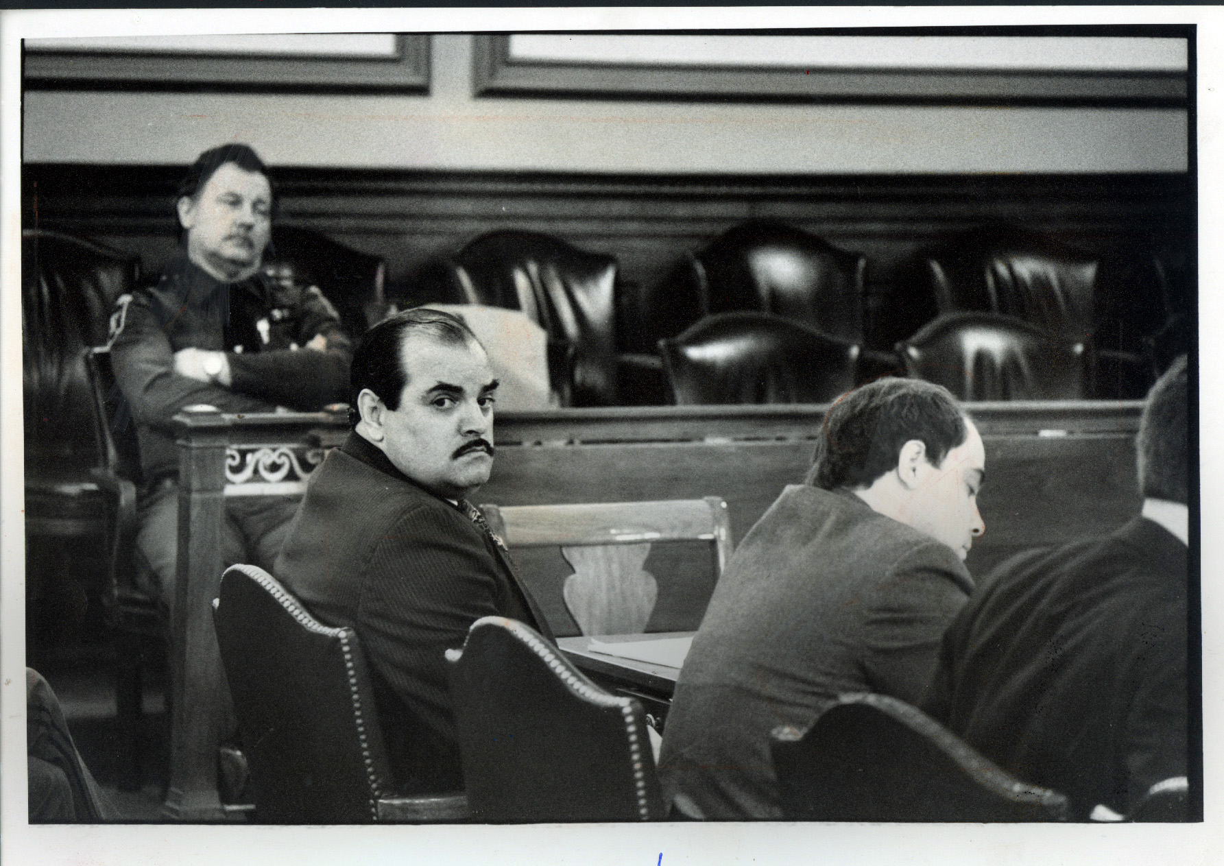 Bobo Marrapese listens during opening statements in Superior Court, Providence, where he faces murder charges in the 1975 slaying of Richard "Dickie" Callei. Courtesy of the Providence Journal/Frieda Squires .
