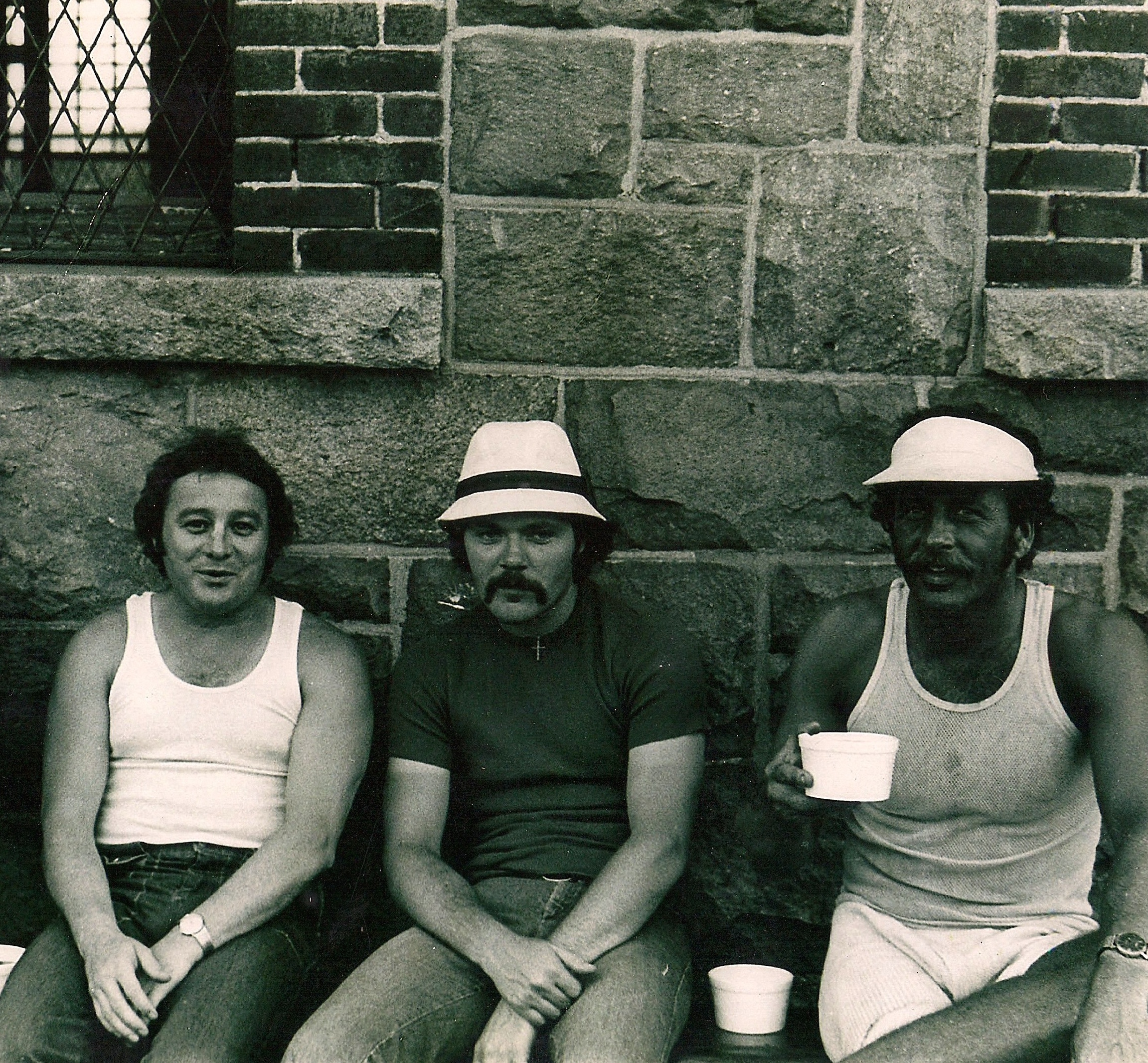 Charles (center) with Gerard Ouimette's brother, John (left), at the Adult Correctional Institutions. John was a prisoner at the time, along with Ronnie Sweet (right). John and Ronnie are drinking rum that Charles smuggled into maximum security.