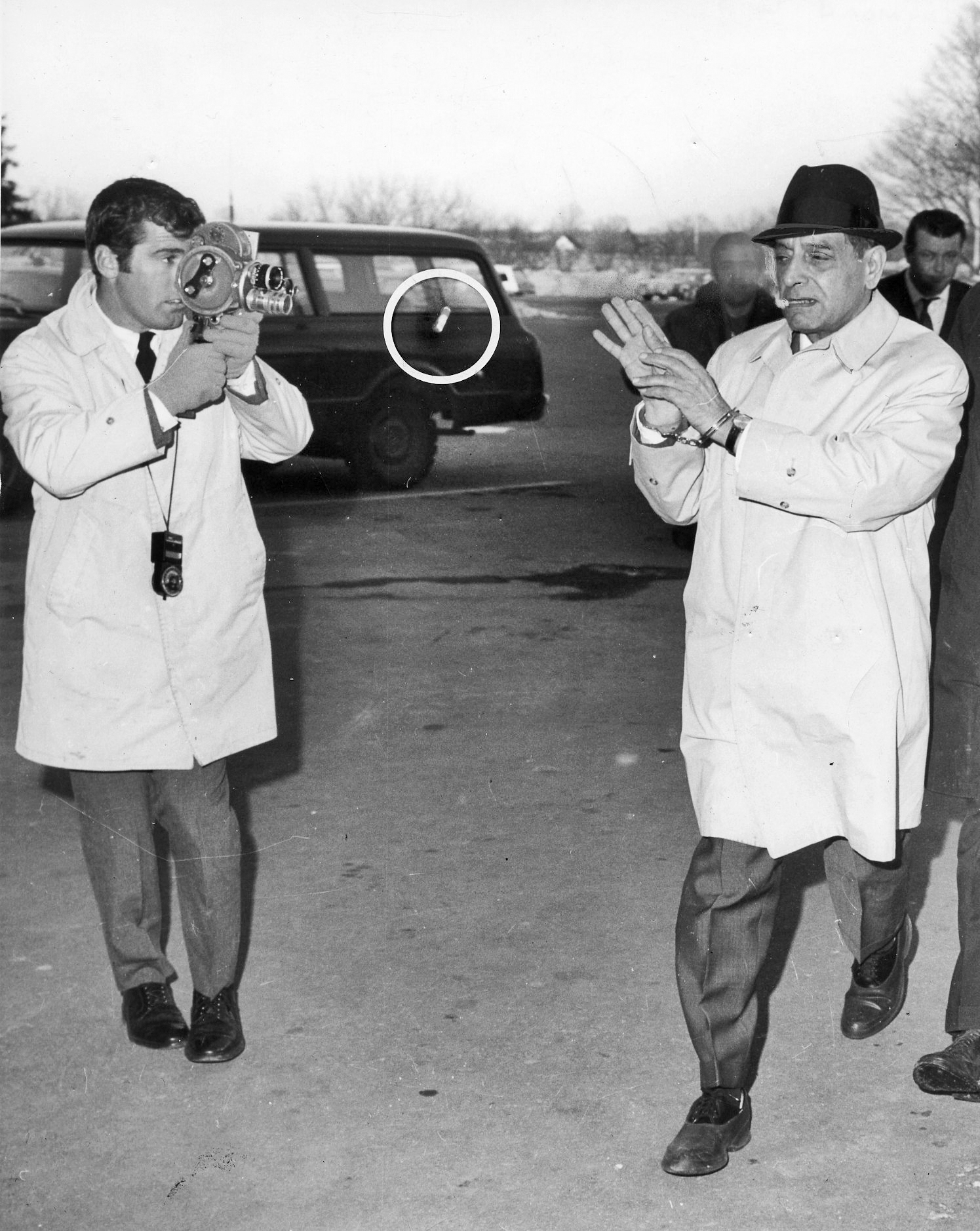 Patriarca flicks his cigar at a reporter as he enters state prison in 1969. Courtesy of The Providence Journal.