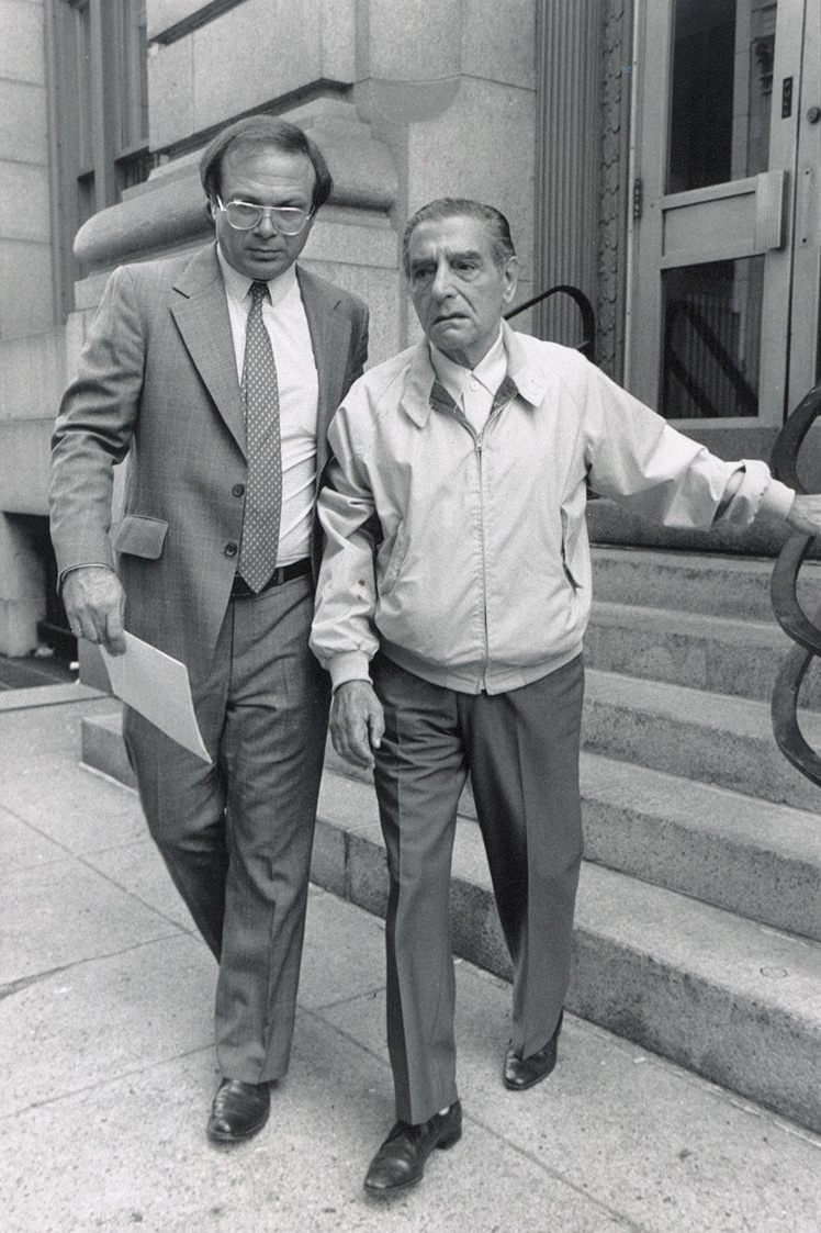 Raymond Patriarca leaves court with his defense lawyer, Jack Cicilline, in the early 1980s. Courtesy of The Providence Journal.