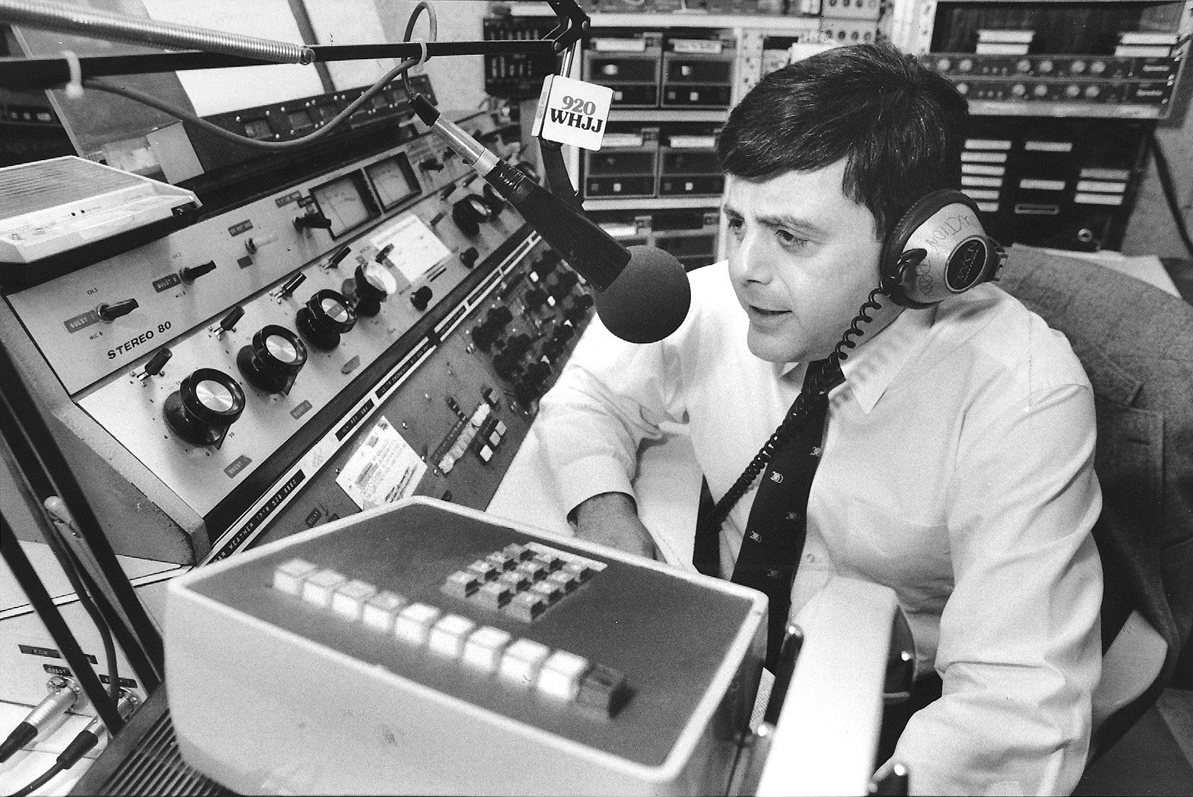 Buddy hosts his live talk-radio show from the WHJJ-AM studios. In June 1990, Buddy announced on-air that he would run again for mayor. Courtesy of The Providence Journal.