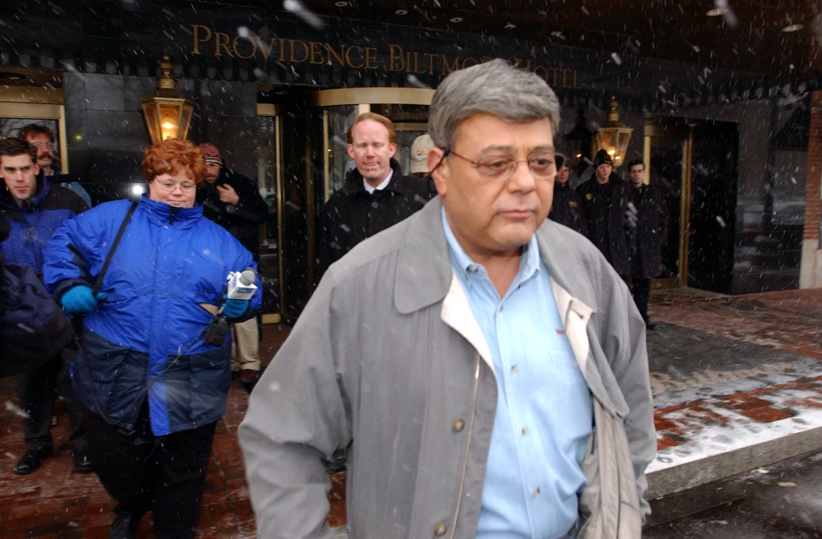 In December 2002, former mayor Buddy Cianci leaves the Biltmore Hotel to drive to federal prison at Fort Dix, New Jersey, where he would serve his five-year sentence. Courtesy of The Providence Journal/Mary Murphy.