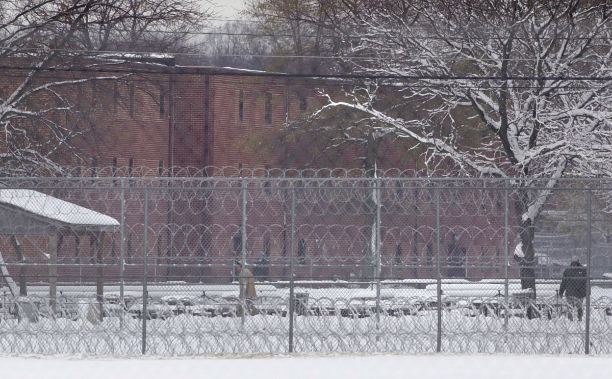 Razor wire surrounds a courtyard at Fort Dix federal prison in New Jersey. There, Buddy Cianci served a prison sentence of four years and five months. Courtesy of The Providence Journal/Gretchen Ertl.