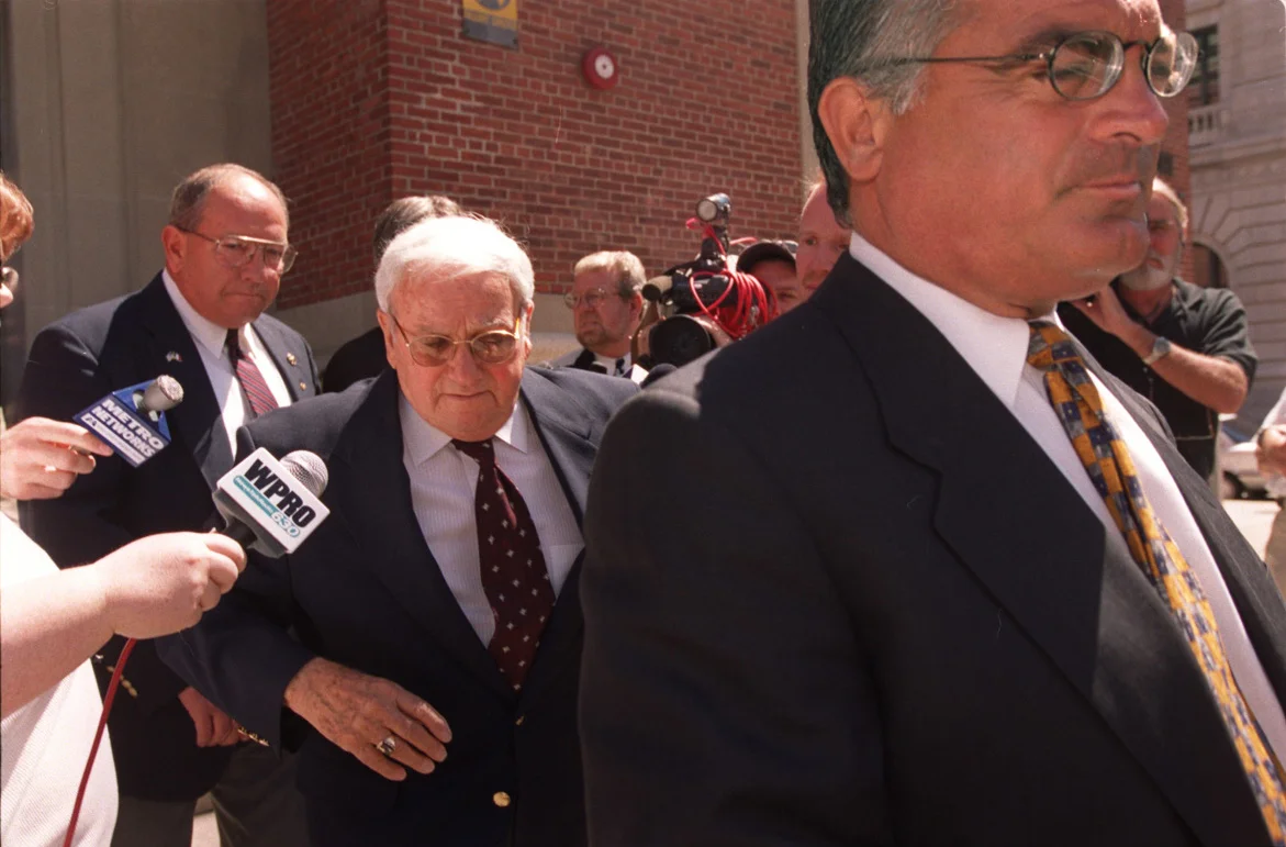 Bevilacqua, right, leaves U.S. District Court with his client Joseph Pannone in 2000. Pannone, who had been a city tax assessor, pleaded guilty to money-laundering and corruption charges in the Plunder Dome case, which also took down former mayor Buddy Cianci. Courtesy of The Providence Journal/Mary Murphy.