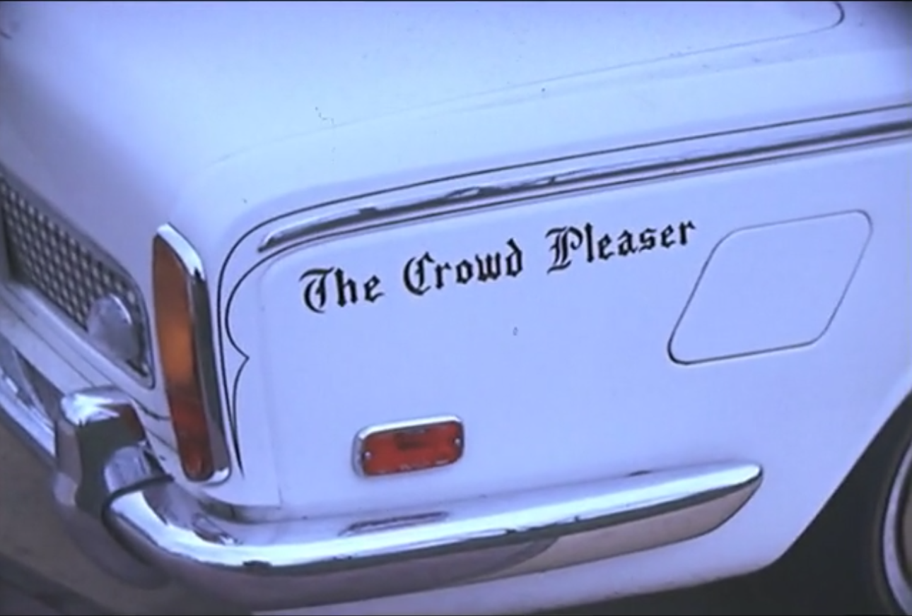 Eddie Jackson and Courtney Brown both owned multiple luxury cars. Eddie customized his Cadillac with this “Crowd Pleaser” decal. He would periodically drive the car through depressed areas of Detroit and throw money out of the window. Courtesy of the Walter P. Reuther Library at Wayne State University.