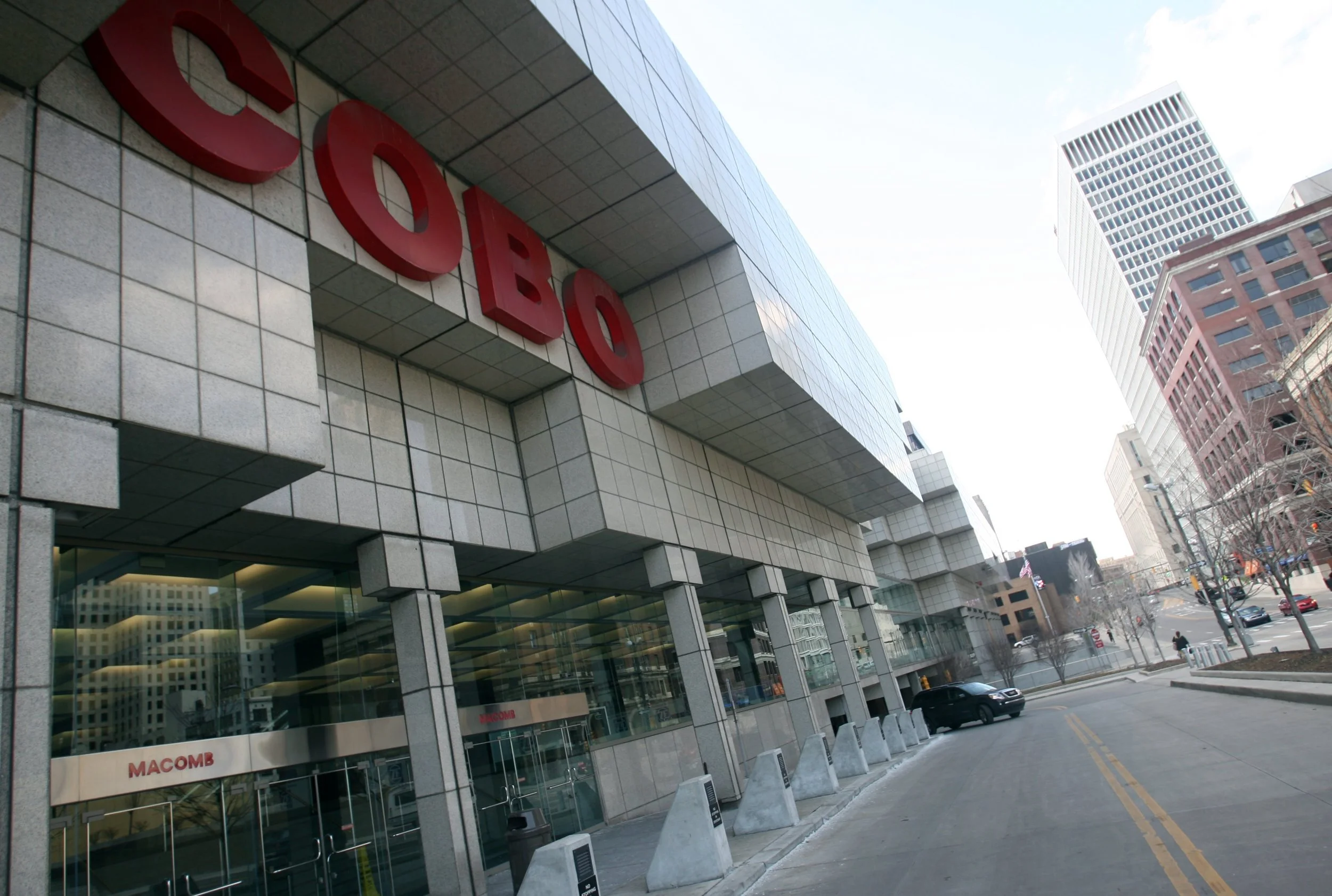 Federal investigators received an anonymous tip that businessman Karl Kado, who managed vendors at the Cobo Hall convention center, was paying bribes to city officials. The FBI convinced Kado to wear a wire, and caught Bernard Kilpatrick on tape discussing payments with him. Courtesy of the Detroit Free Press.