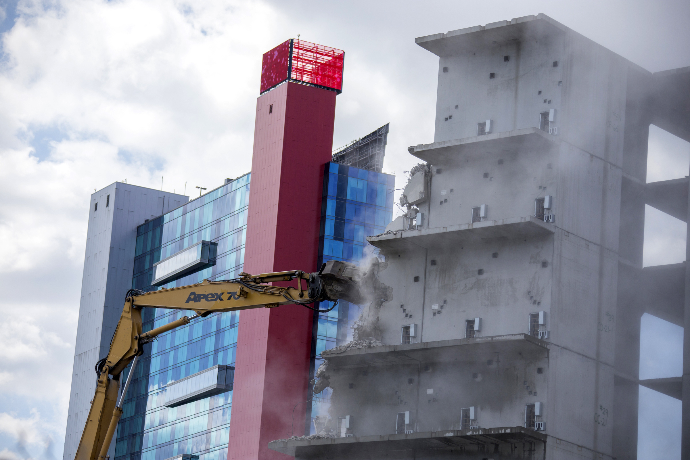 In the shadows of the Greektown Casino Hotel, demolition began on the failed Wayne County Jail project in 2018. After millions of dollars were poured into the project, construction was halted due to cost overruns. The property was later sold to a private business concern led by billionaire Dan Gilbert. Courtesy of the Detroit Free Press.
