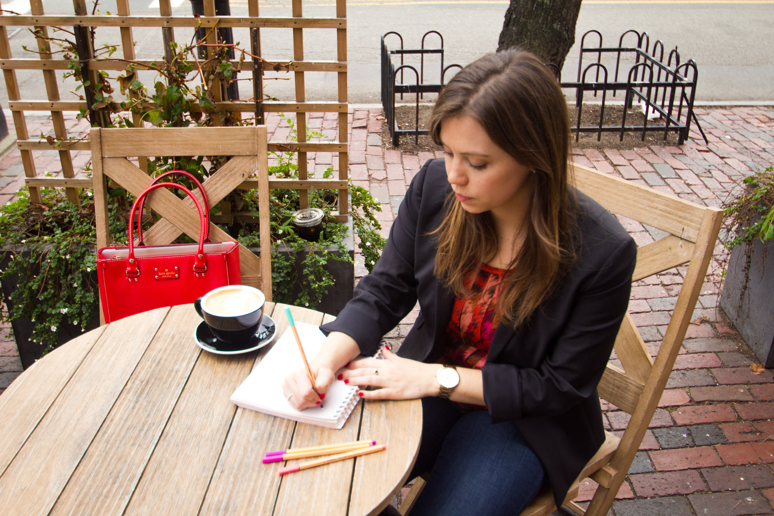 writing at table poised.jpg