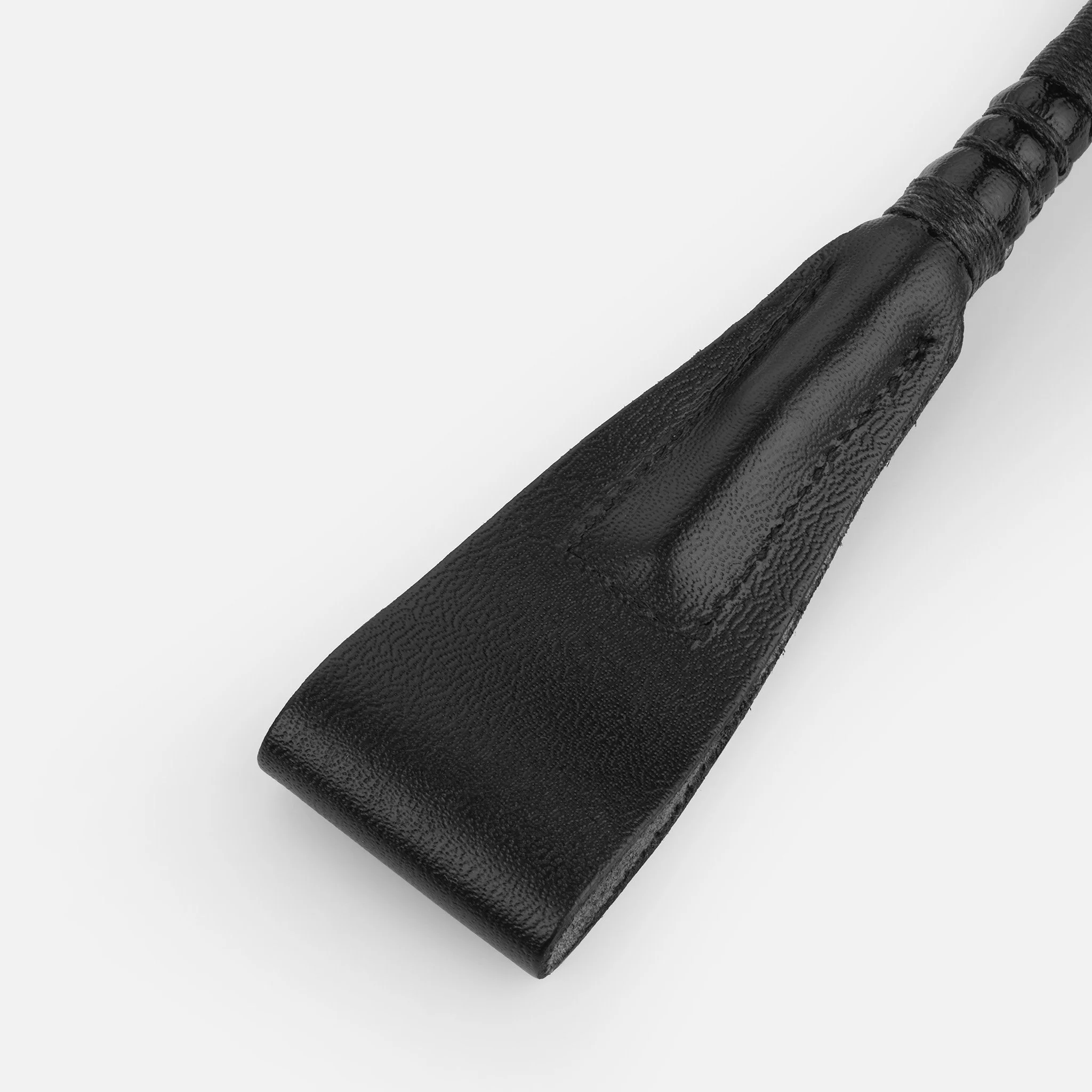 Black leather riding crop keeper
