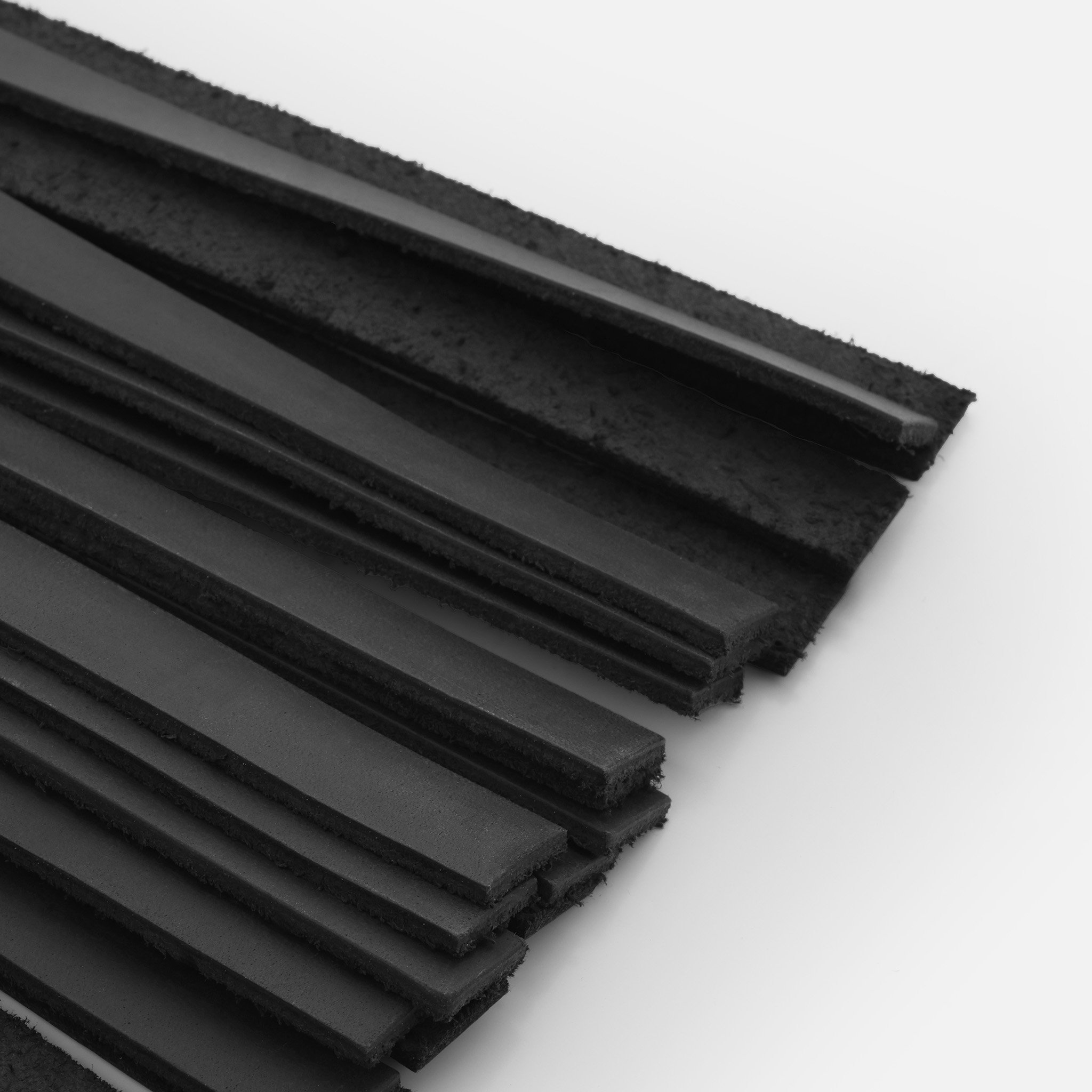 Close-up of 22 5mm leather tails on medium weight flogger