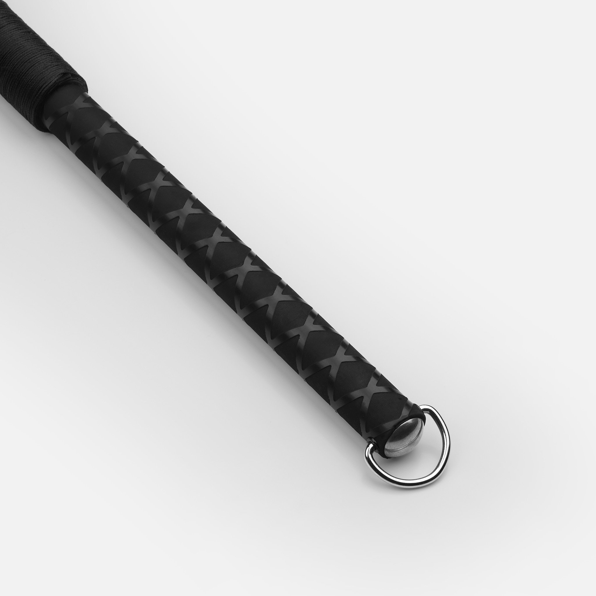 Extended handle on heavy black latex flogger