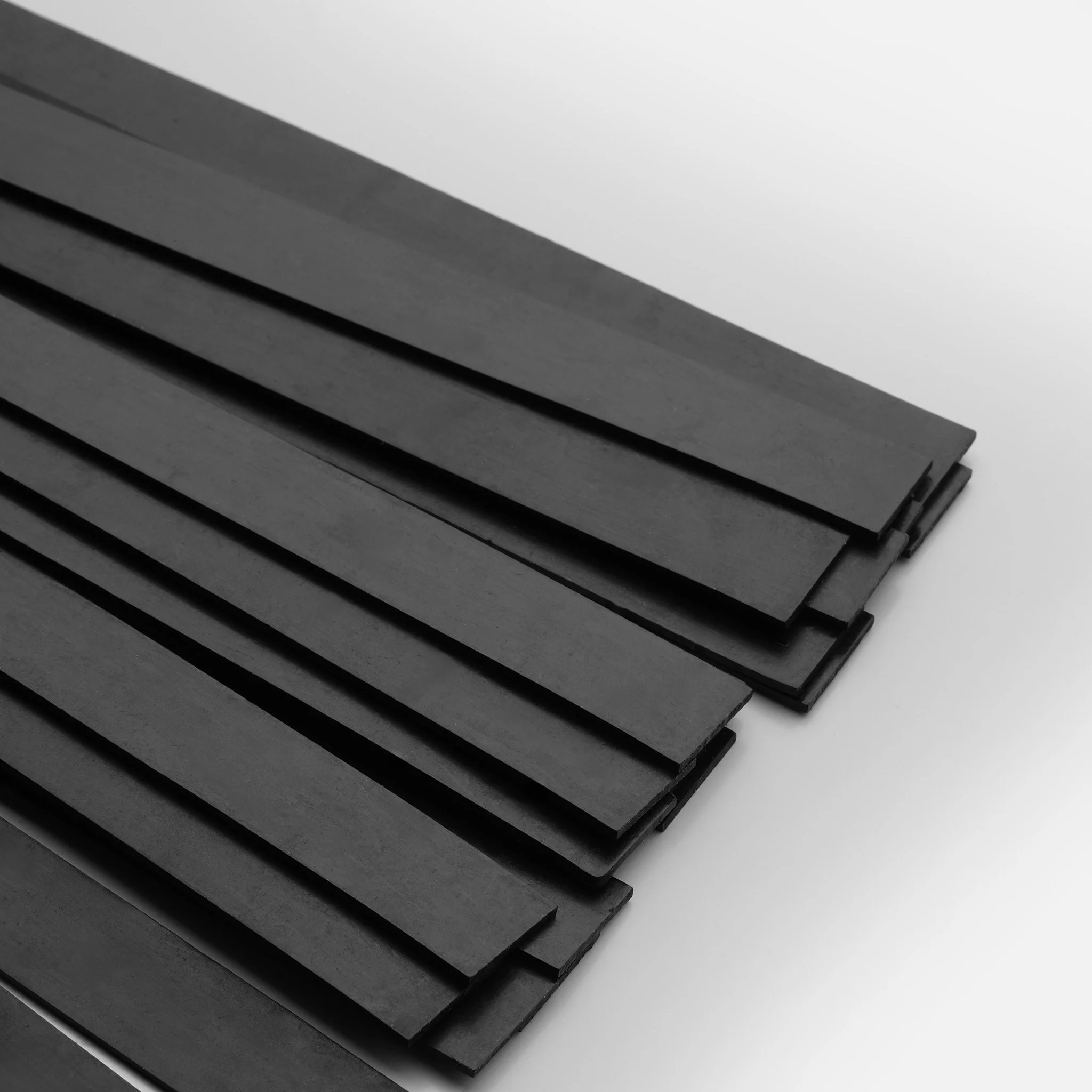 Dense black latex tails on heavy weight flogger