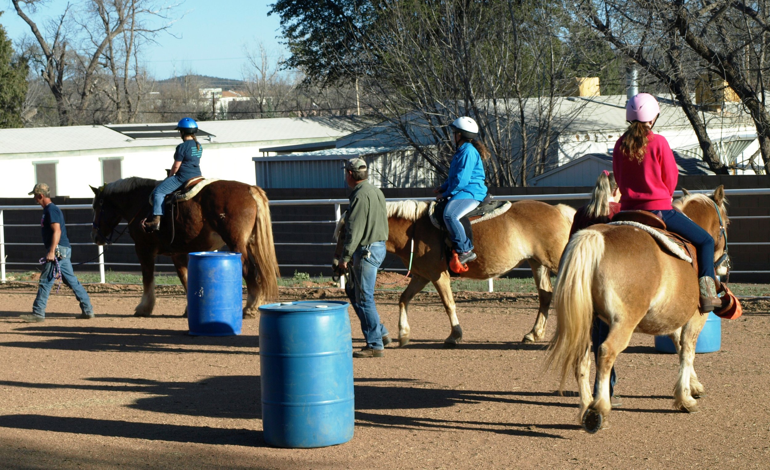 1.The Girls Club riding around the drums.jpg