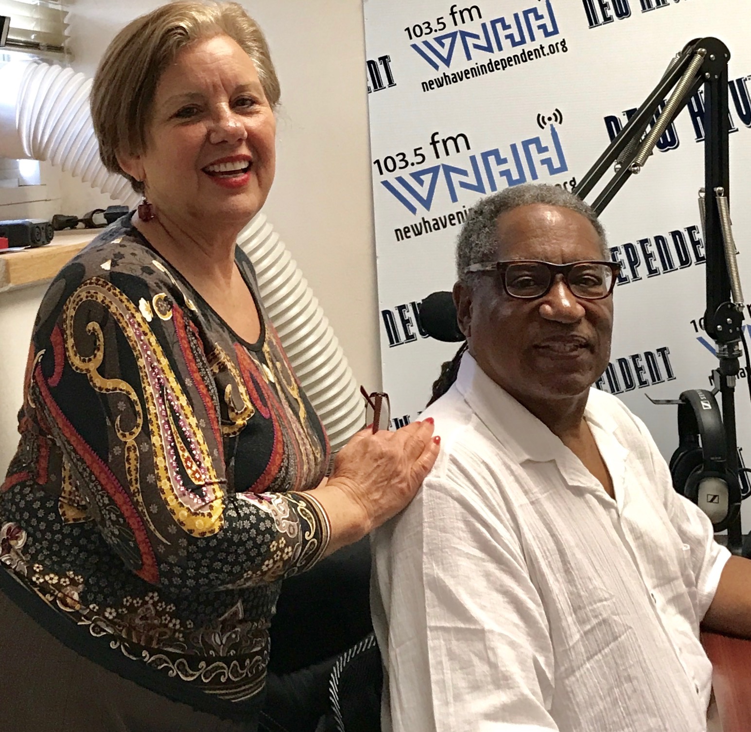 Host Tom Ficklin looks up at the stars with Astrologer Jill Dotlo. 