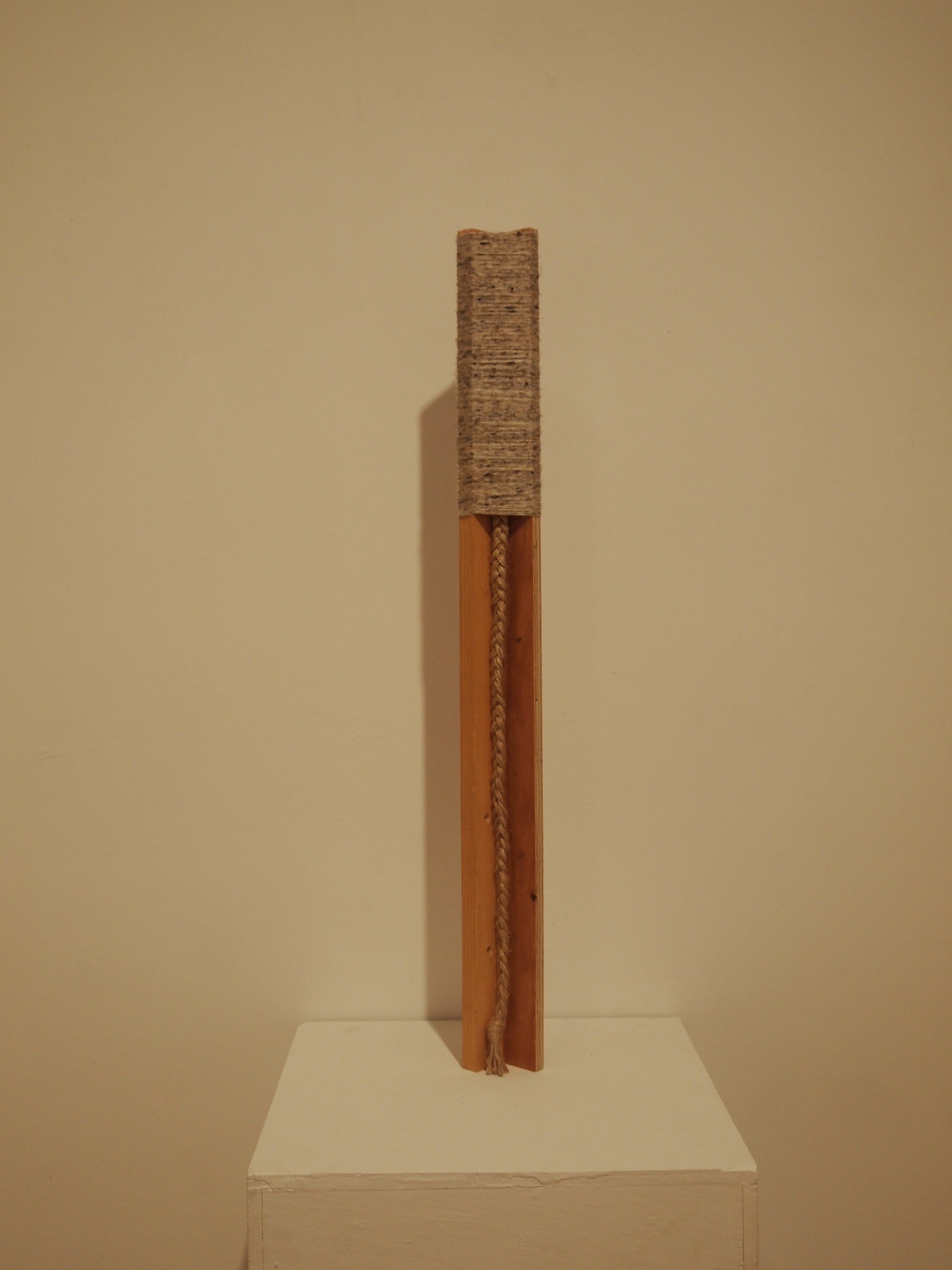  Found wood, wrapped with found yarn; with yarn braid 