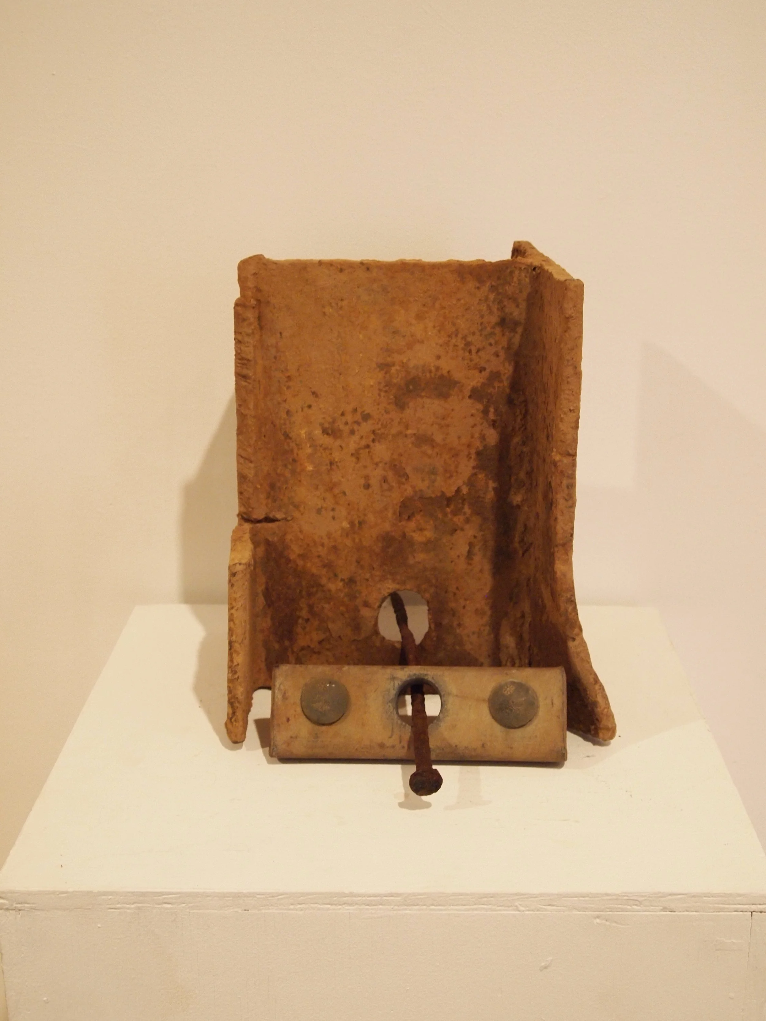  Found i-beam, metal spike, and powerline clamp 