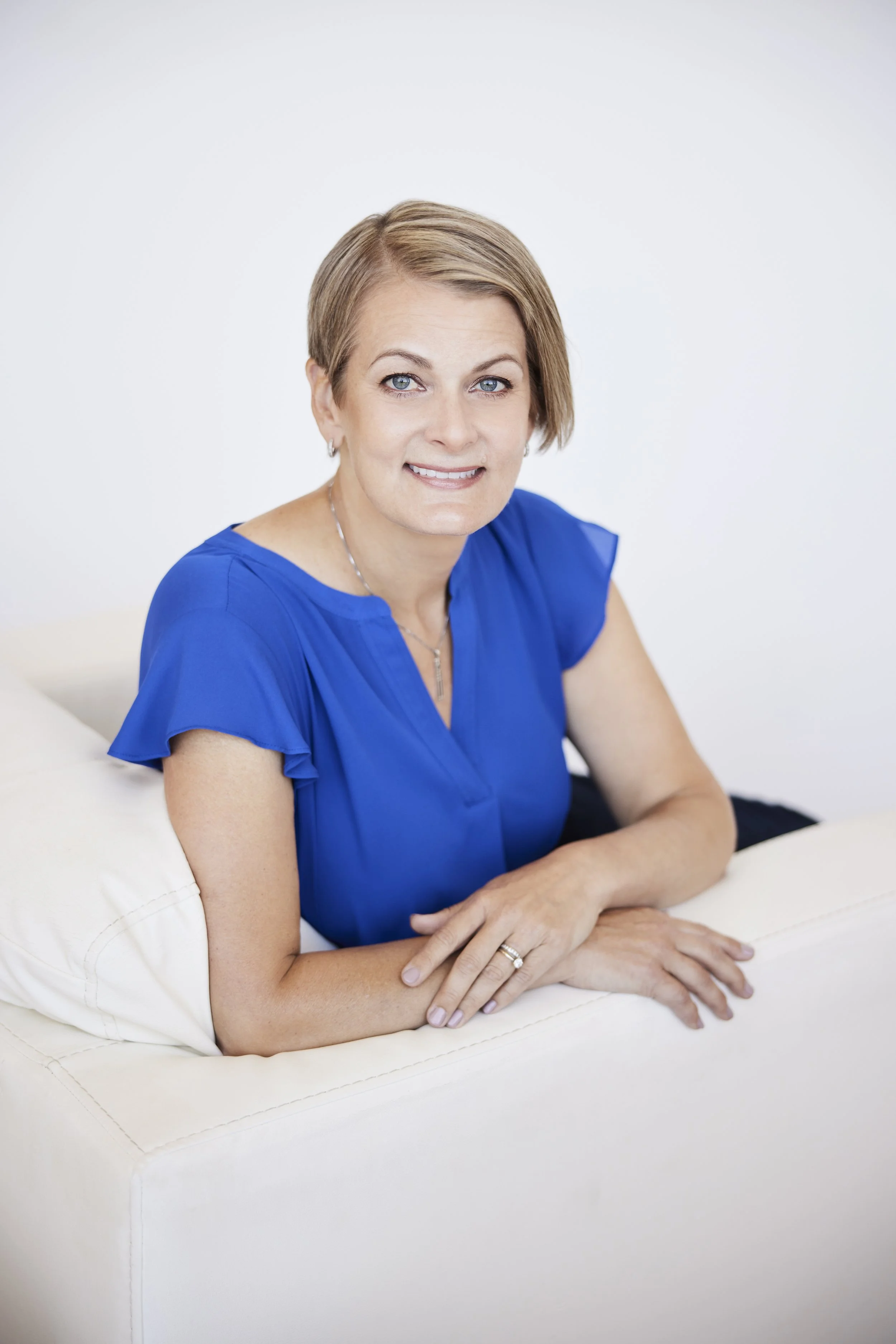 Professional coach posing for a branding portrait