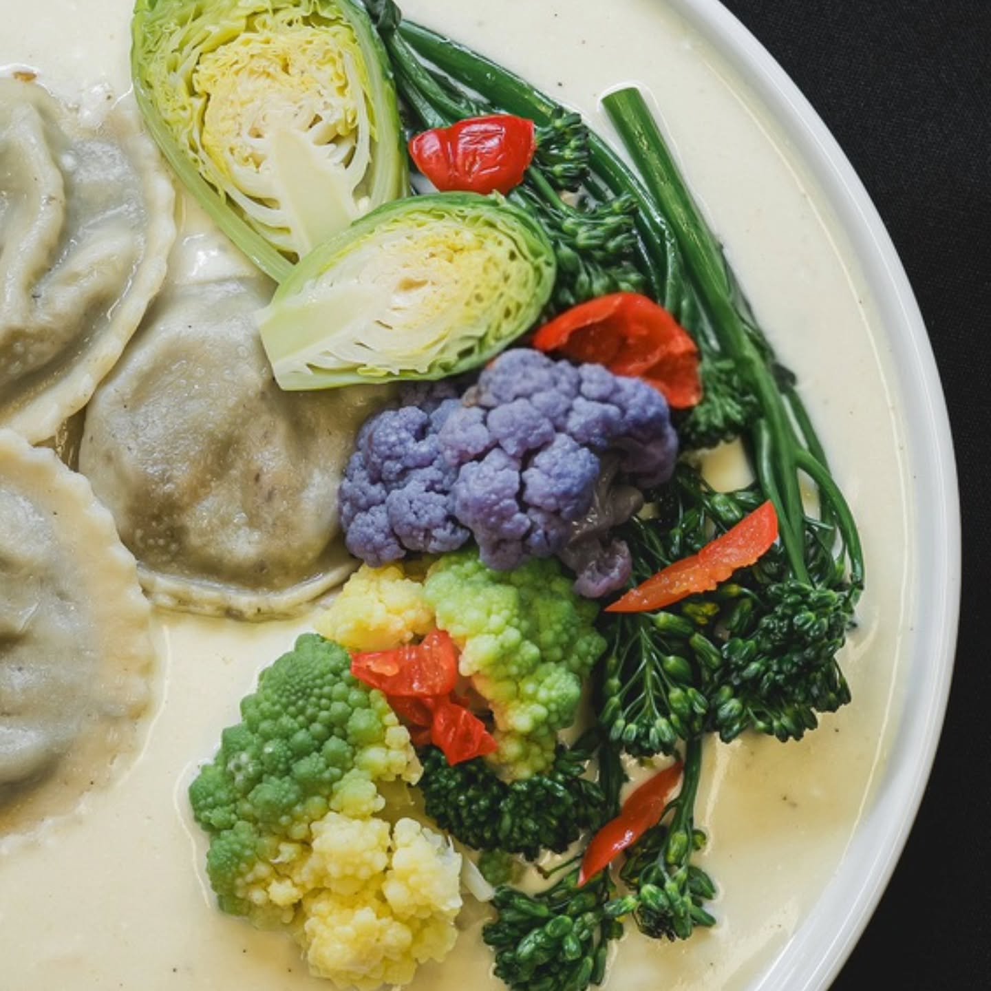 The holidays are over and now its just drab winter until spring comes around. So, here's some color for your feed and your spirit. 🌈

Brassicas Ravioli: wild mushroom ravioli, brussels sprouts, romanesco, purple cauliflower, broccolini, peppadew, go