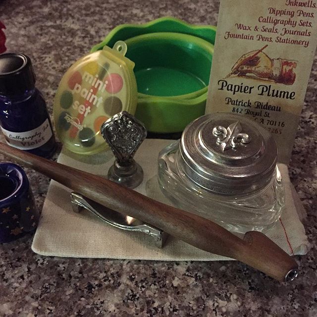 NOLA haul. Papier Plume store. Pewter stand, fleur-de-lis inkwell and wax seal created by La Measure du Temp in Paris. Violet ink and oblique with universal fit. Switches righty &amp; lefty!! I'm still trying both right now to decide if I like obliqu