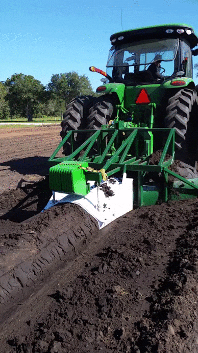The GPS auto-steer tractor pulls raised beds in a new blueberry field.