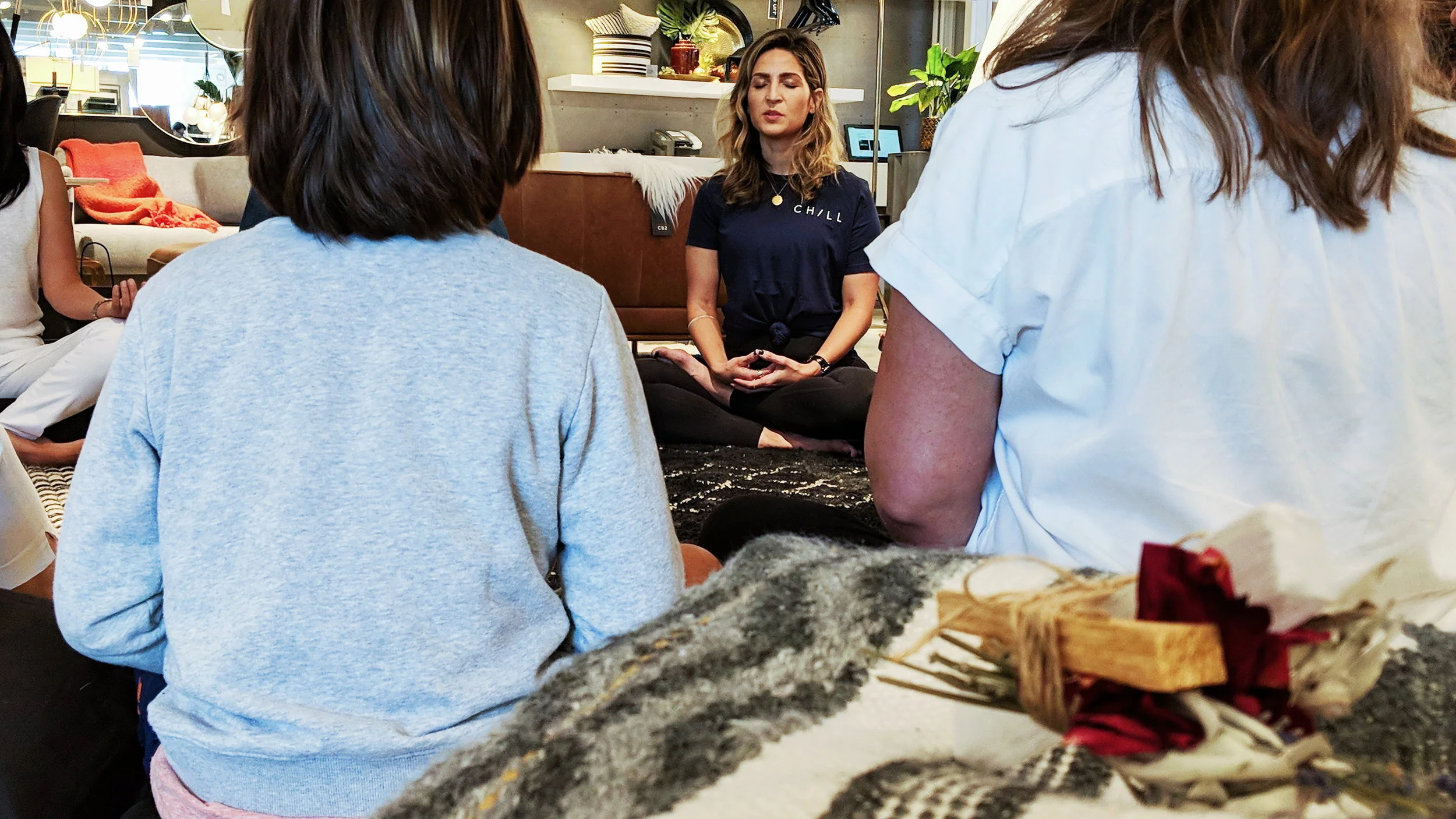 Chill representative Rosie Acosta guides a meditation at CB2 Los Angeles.