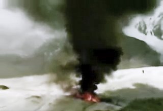  Video stills taken by the artist from the online video of a helicopter crash on Mount Everest base. 