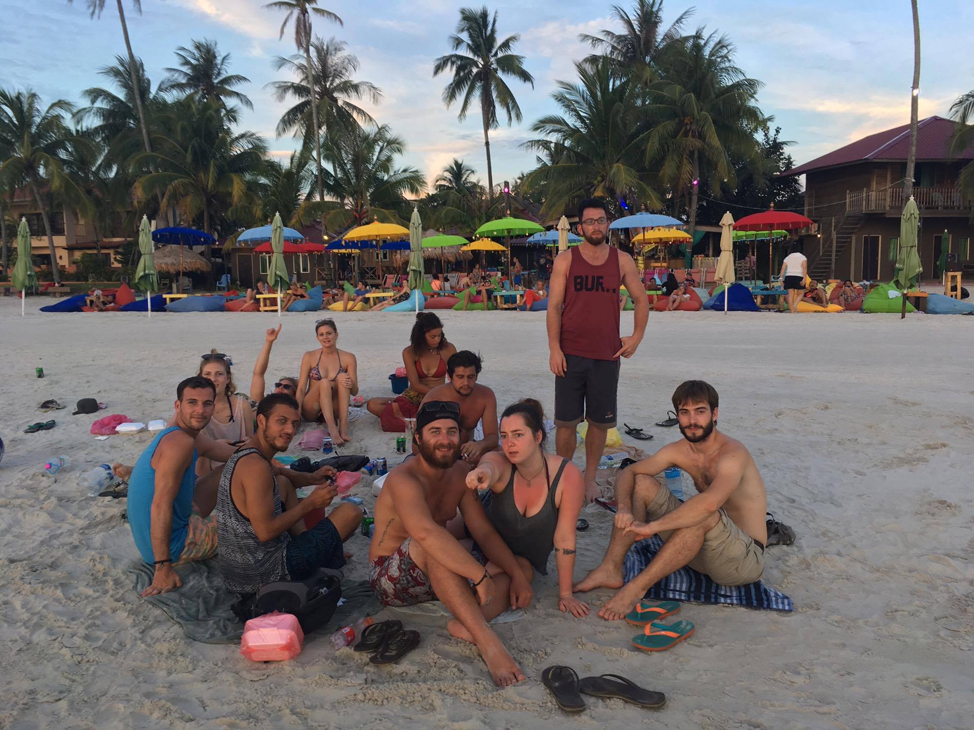 The Chicken Gang gets some downtime to catch the sunset on Cenang beach.