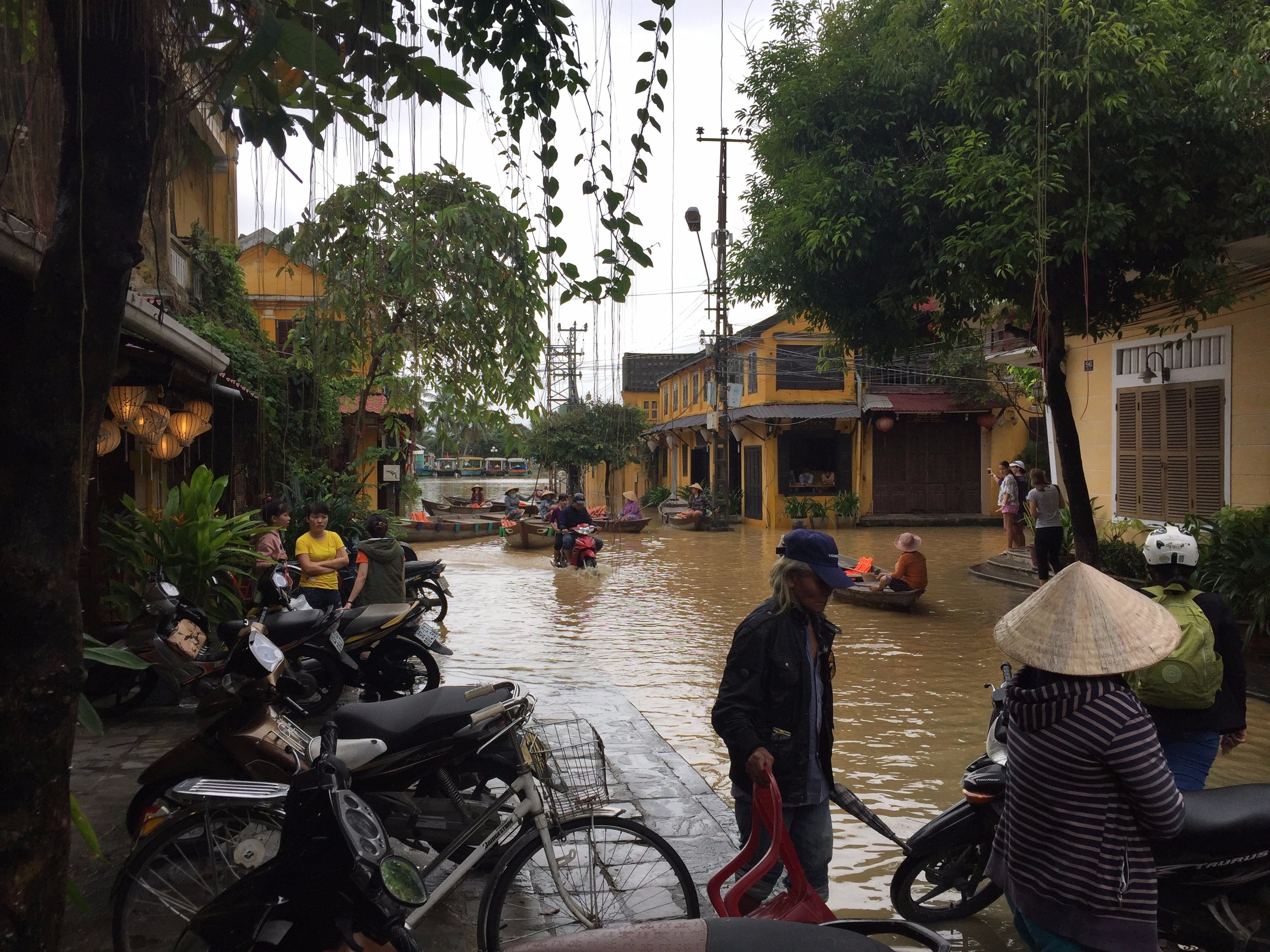 Leave it to enterprising locals to offer tourists boat rides down city streets immediately when it floods.