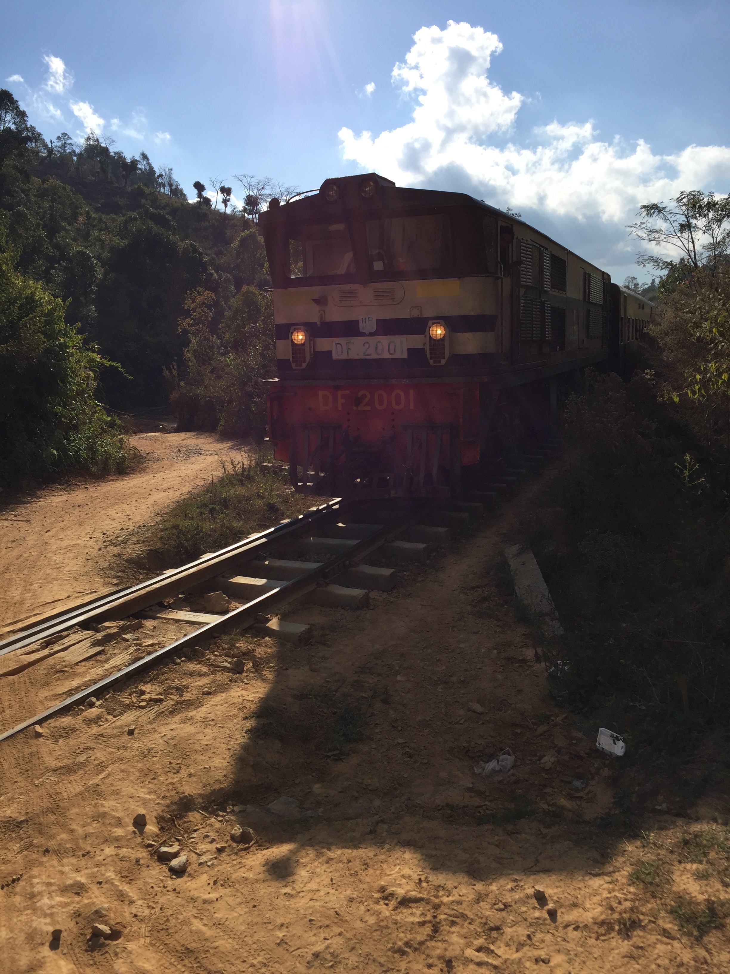 A train passes us trekking down the tracks towards Inle Lake.
