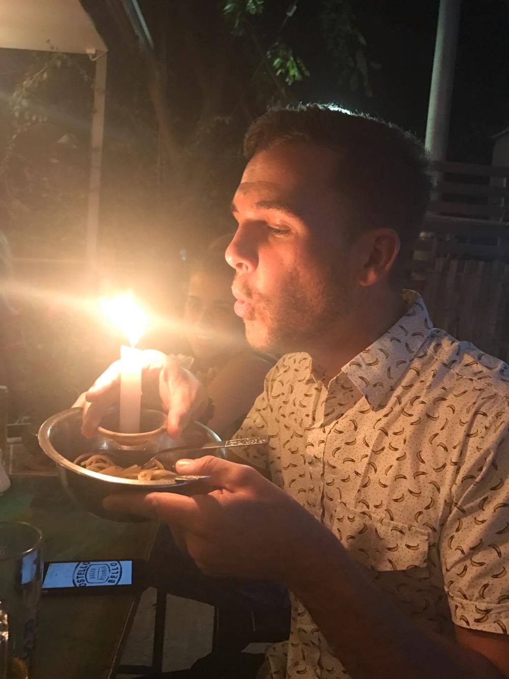 Blowing out the candles on my Bagan birthday noodles - 28 on the 28th.